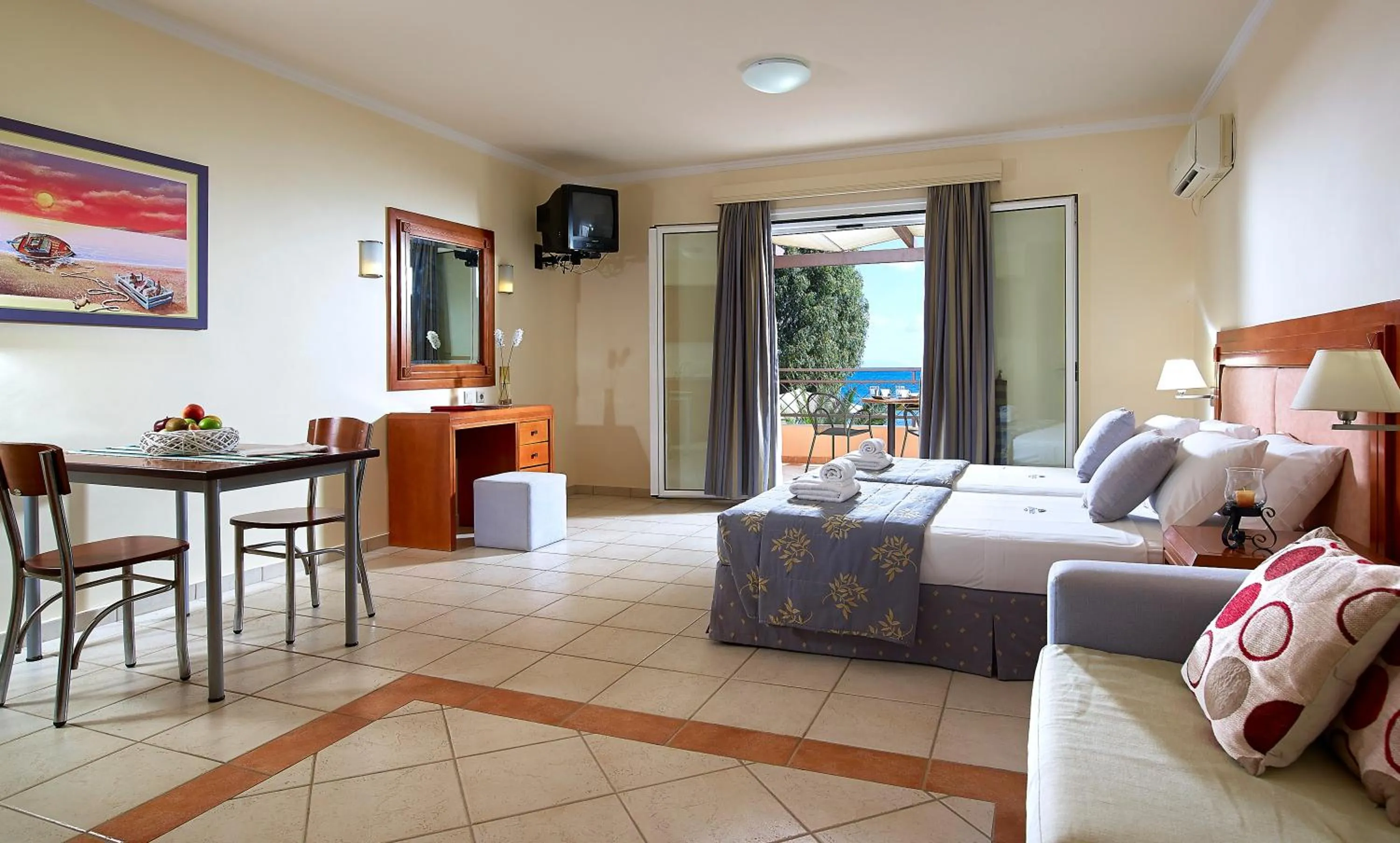 Bed in Avantis Suites Hotel