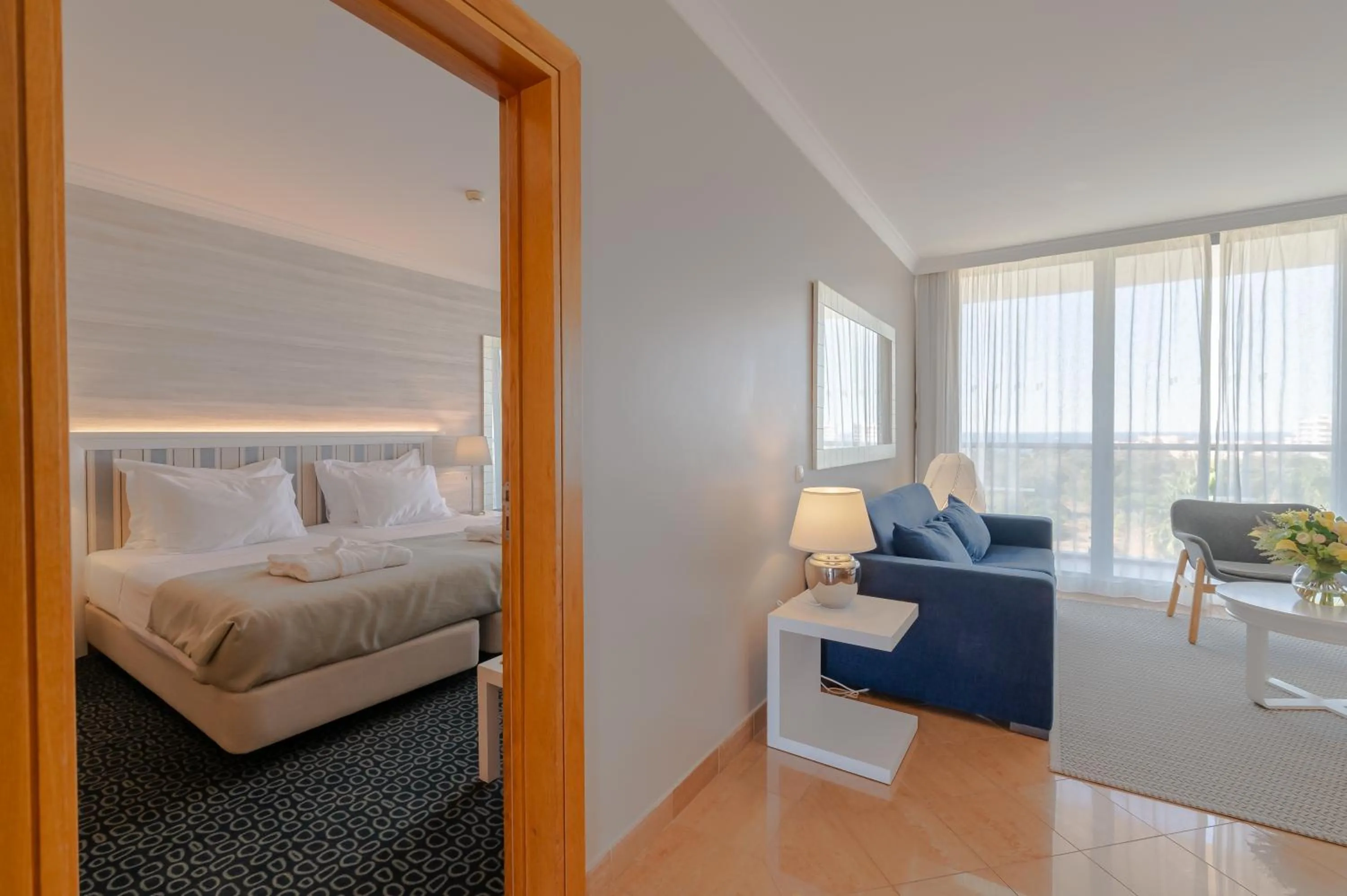 Living room, Bed in Pestana Alvor Park Suites Hotel