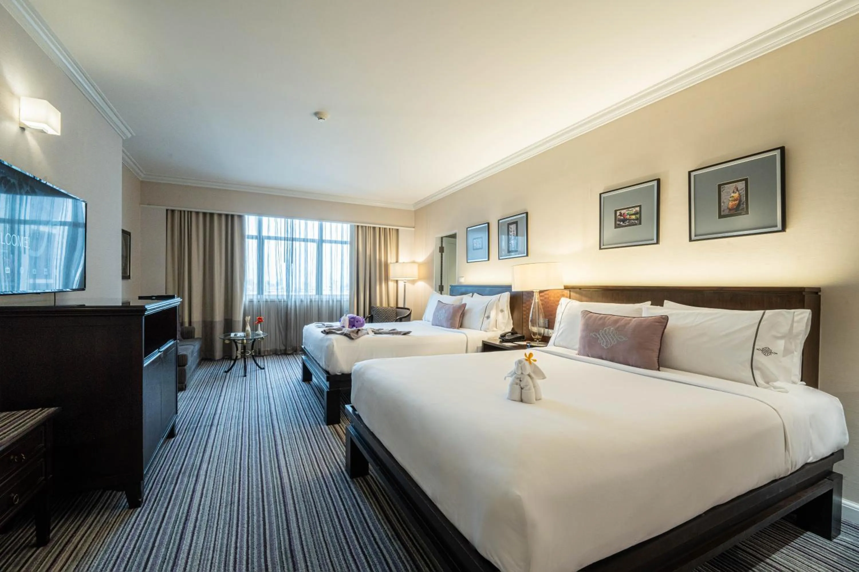 Bed in The Sukosol Hotel