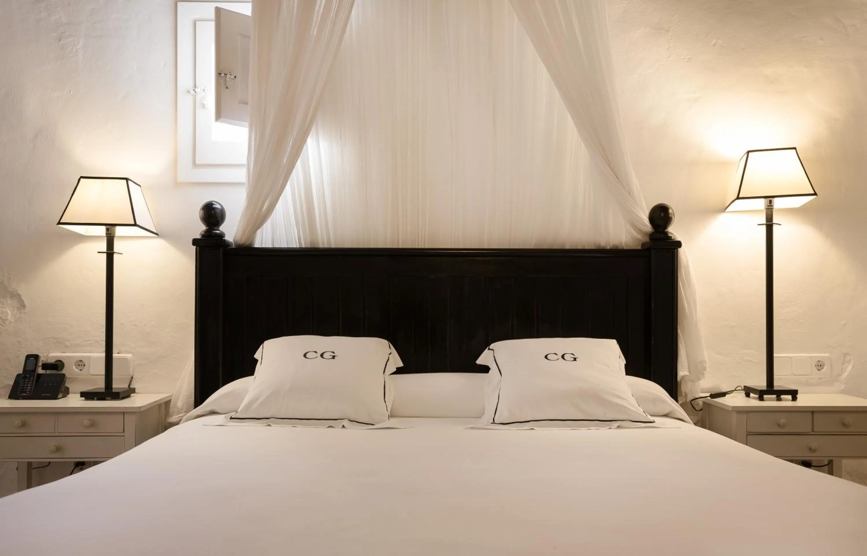 Bed in Agroturismo Can Guillem