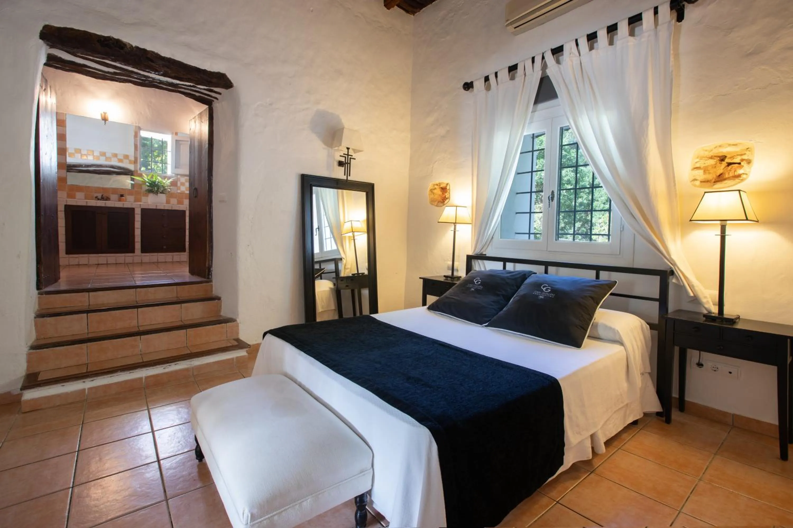 Bed in Agroturismo Can Guillem