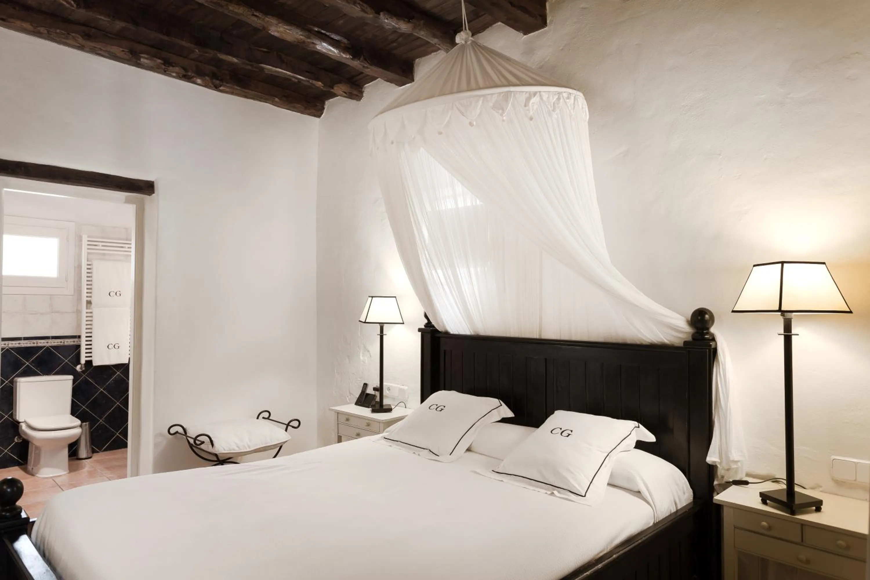 Bed in Agroturismo Can Guillem