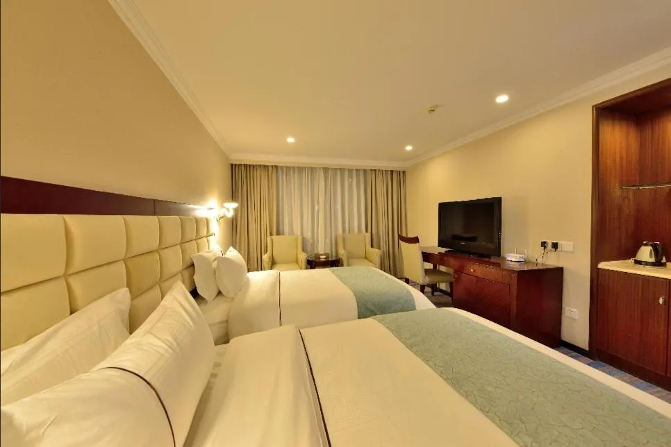 Bed in Hai Jun Hotel Guangzhou