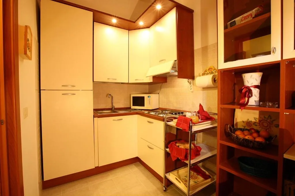 Kitchen or kitchenette in B&B Cappuccino - Piazza Bologna Roma