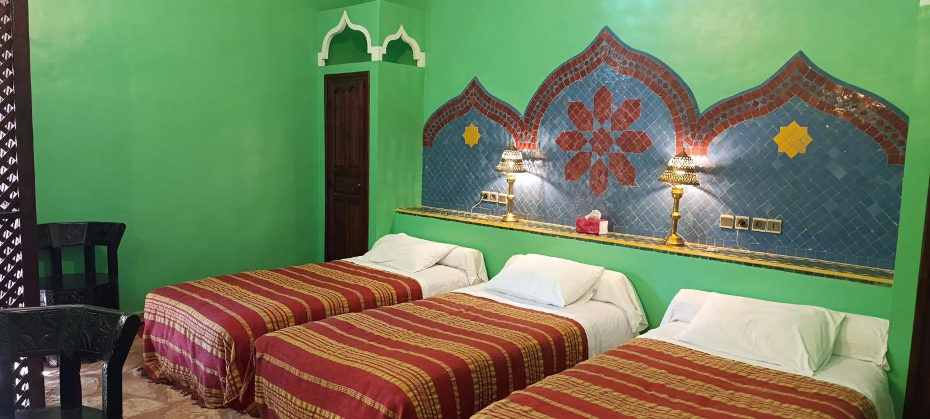 Bed in Hotel Kasbah Azalay