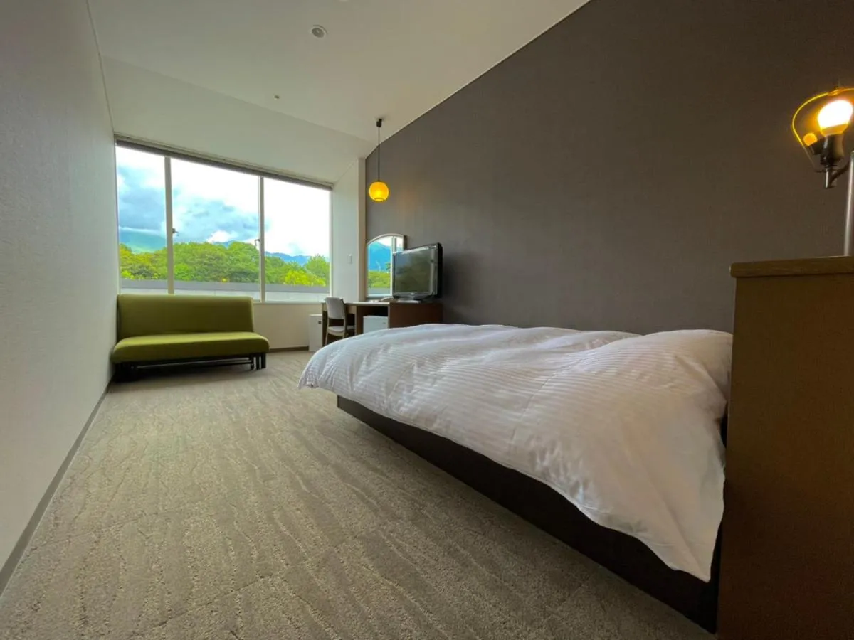 Bed in Hotel Beppu Pastoral