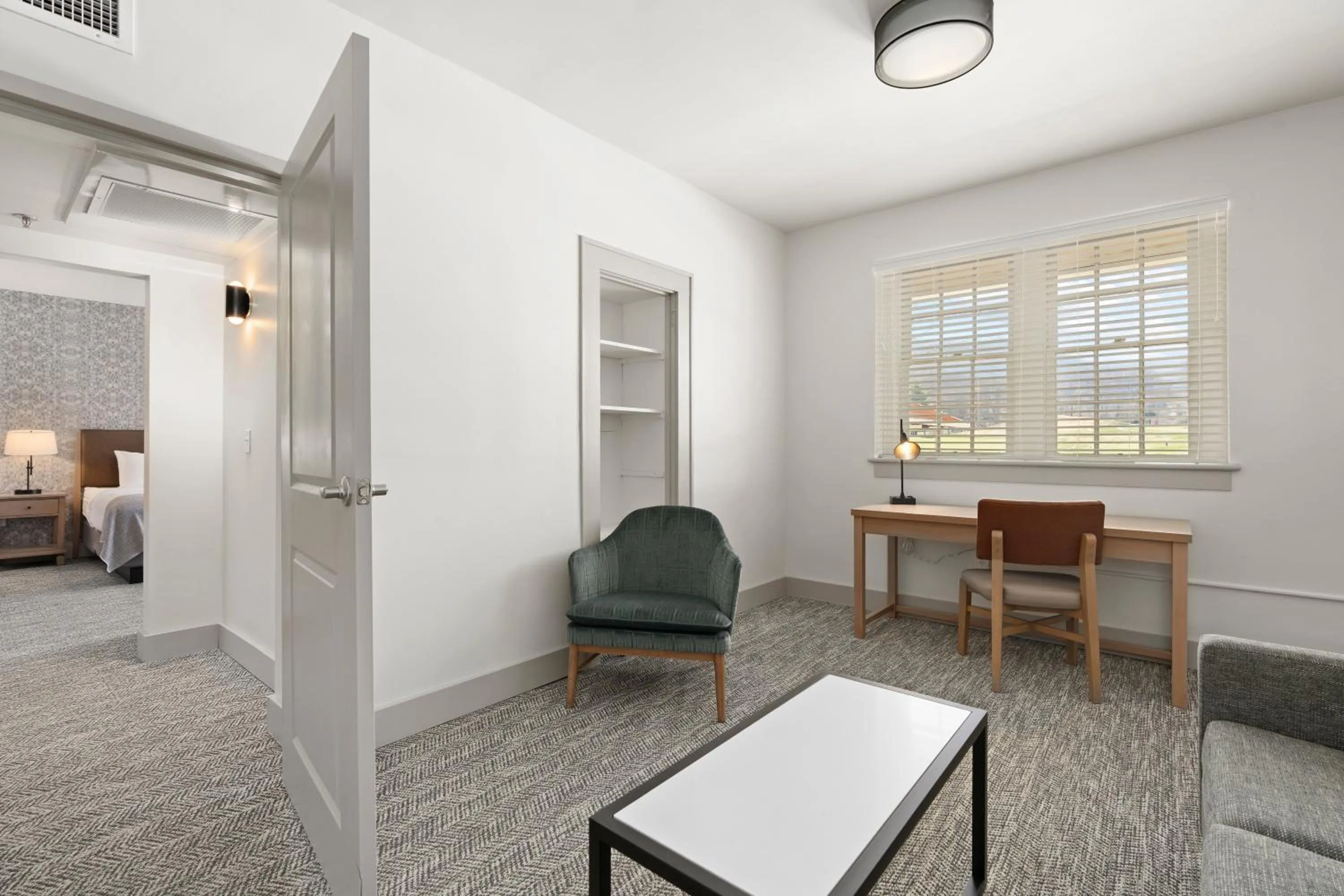 Seating area, Bed in Waynesville Inn and Golf Club, Tapestry Collection by Hilton