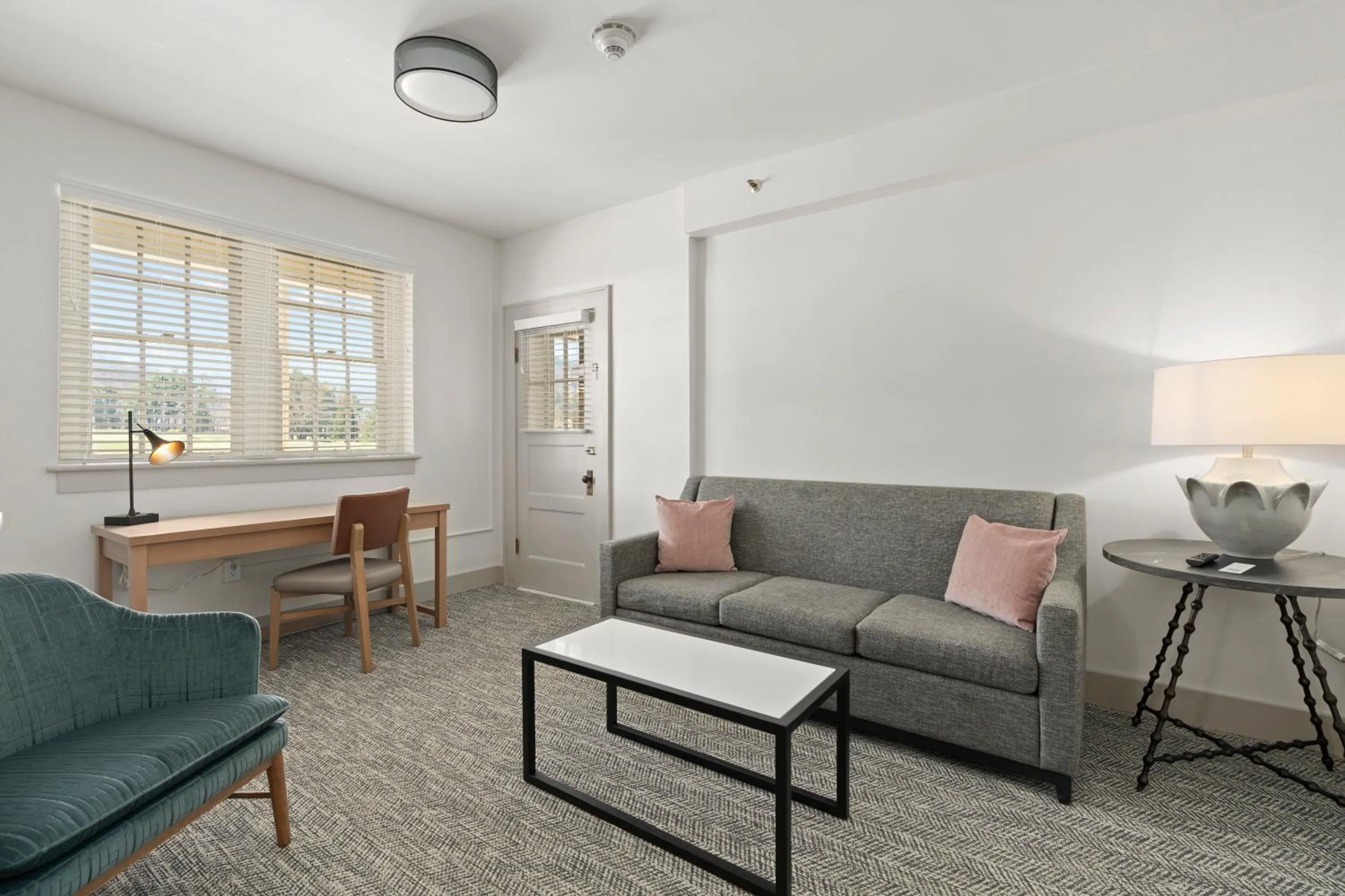 Seating area in Waynesville Inn and Golf Club, Tapestry Collection by Hilton