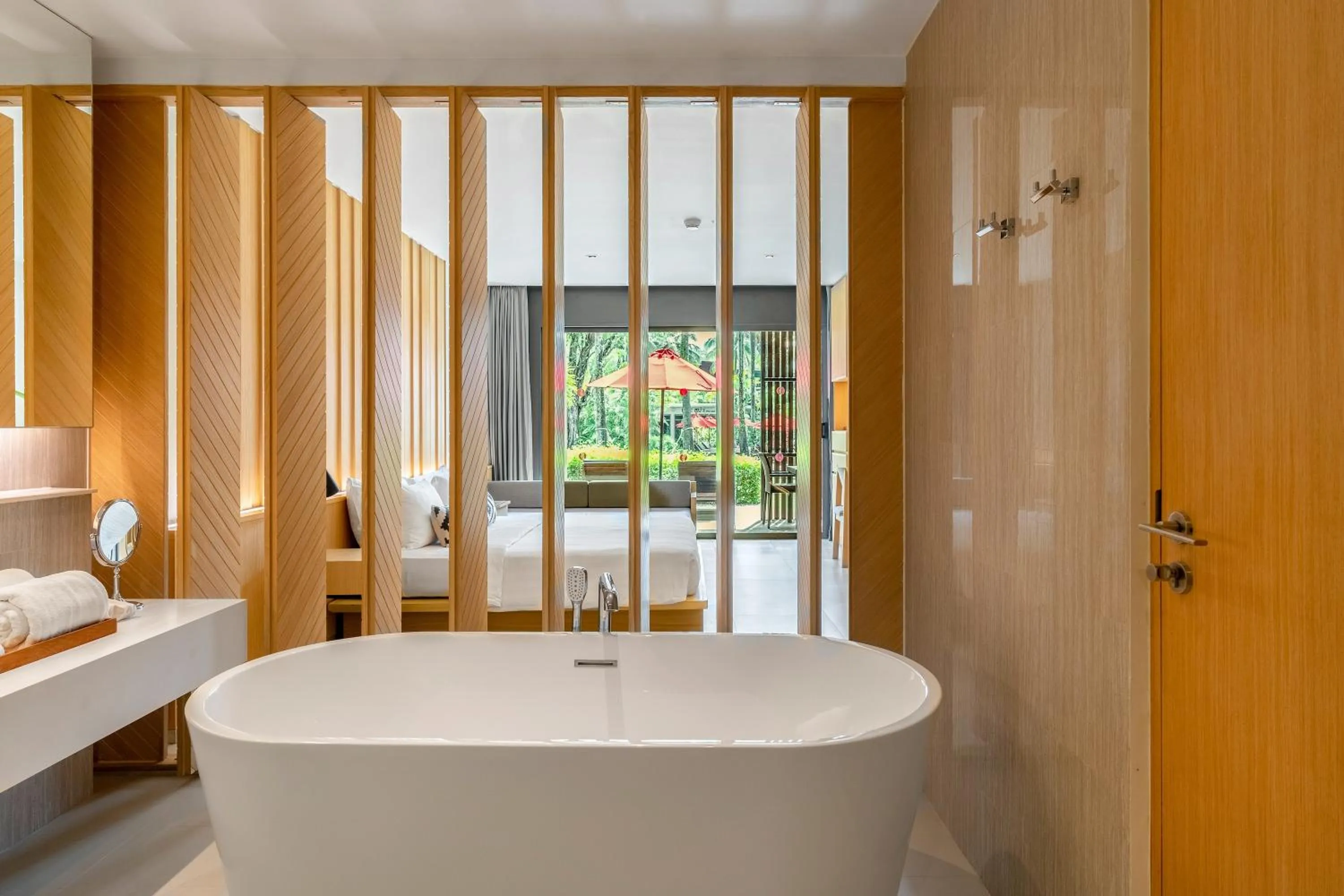 Bathroom, Bed in Ramada Resort by Wyndham Khao Lak