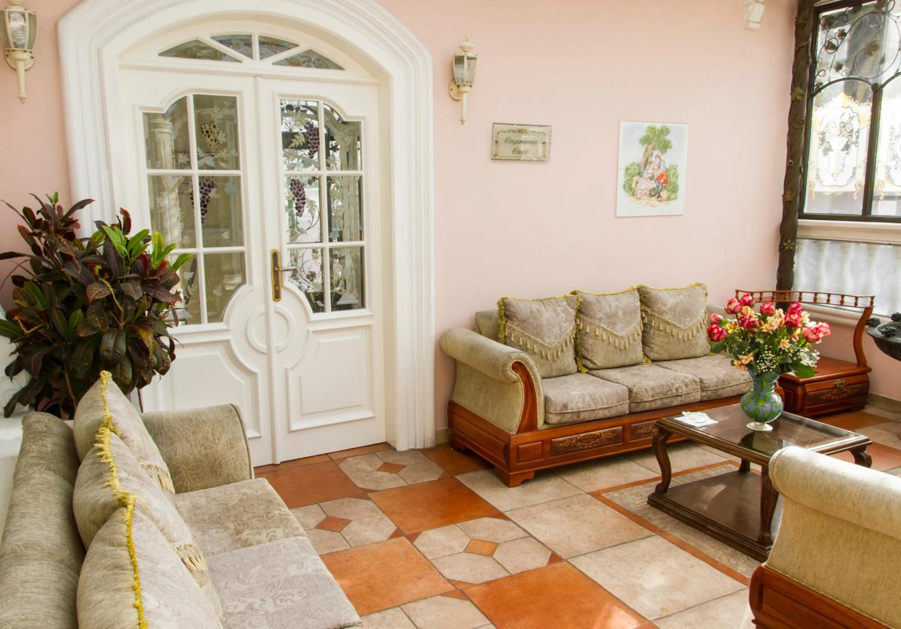 Communal lounge/ TV room in Eugenia Hotel