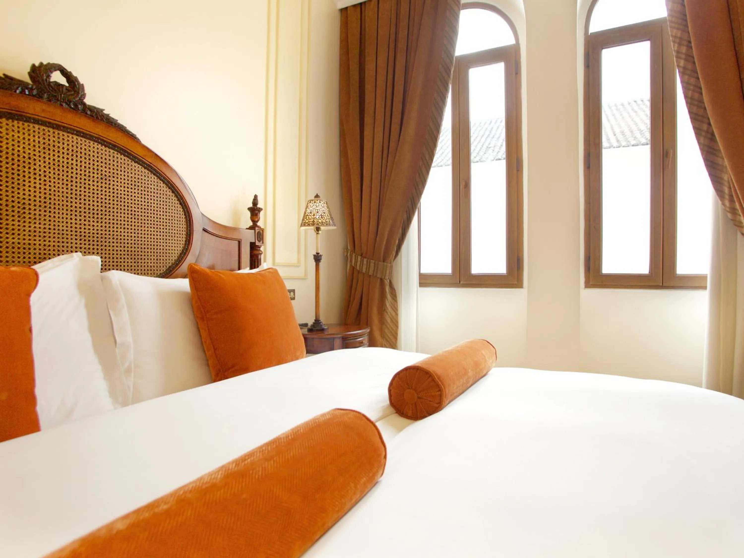 Bed in Plaza Grande Hotel