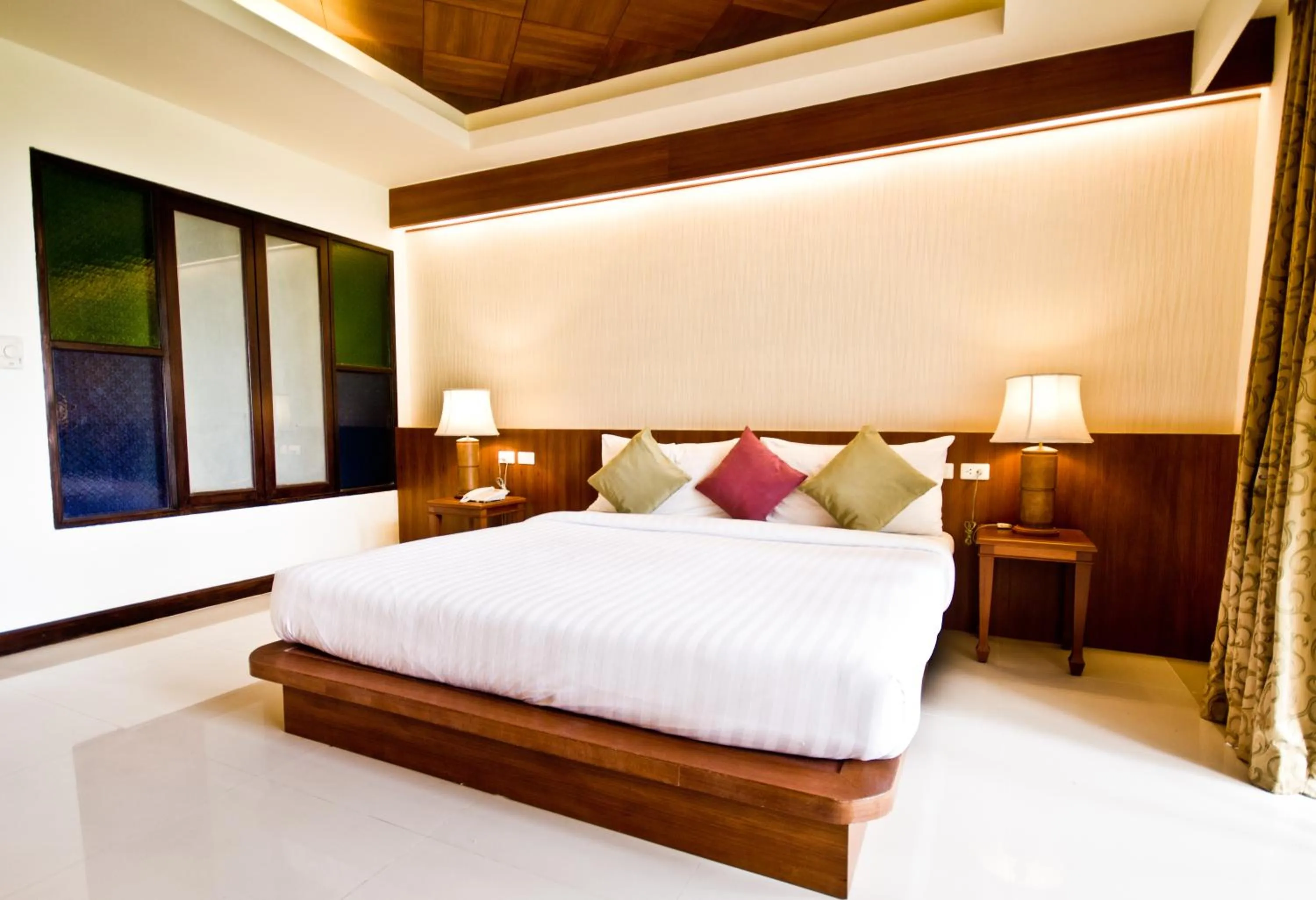 Bed in Khaolak Orchid Beach Resort - SHA Extra Plus