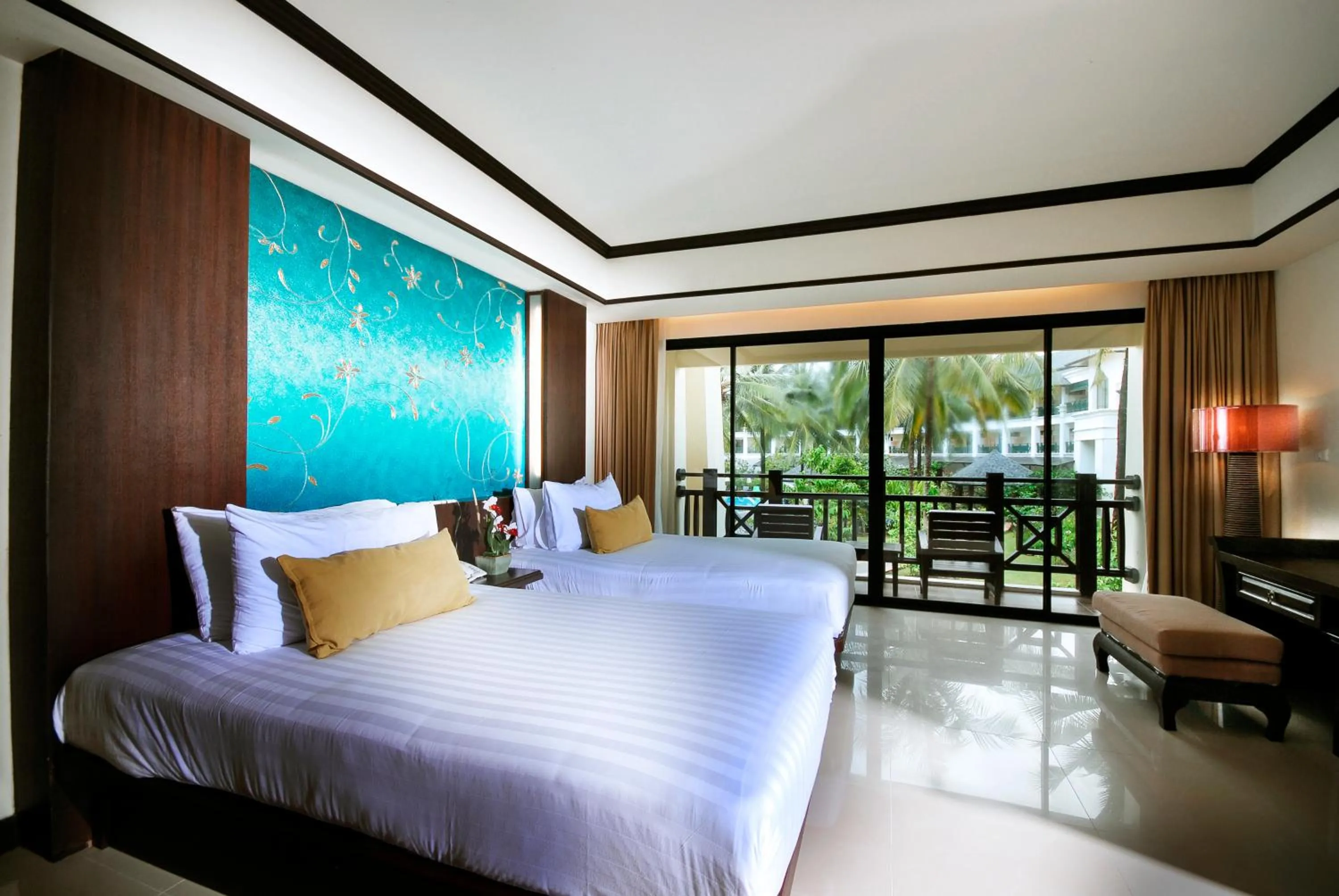 Bed in Khaolak Orchid Beach Resort - SHA Extra Plus