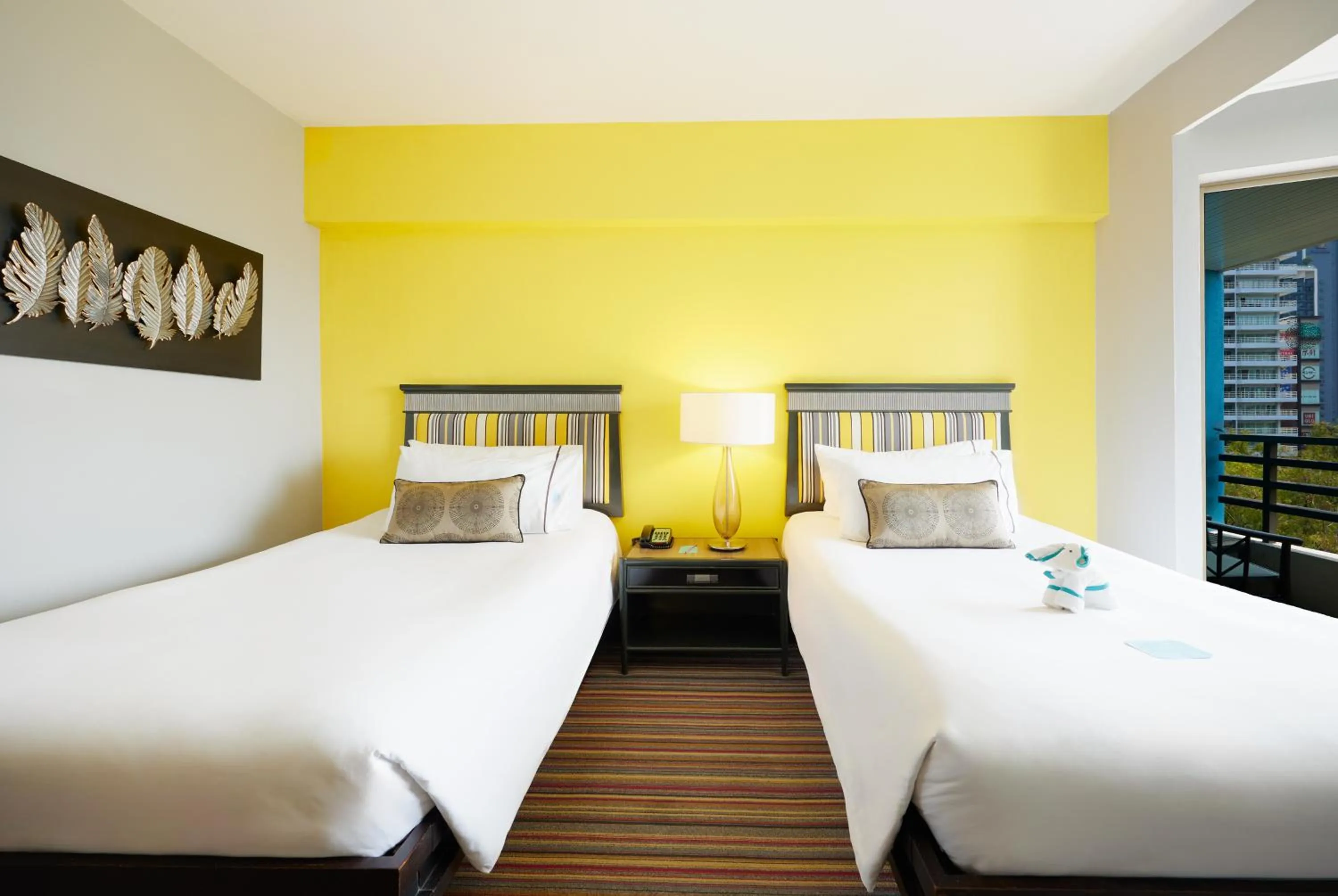 Bed in The Bayview Hotel Pattaya