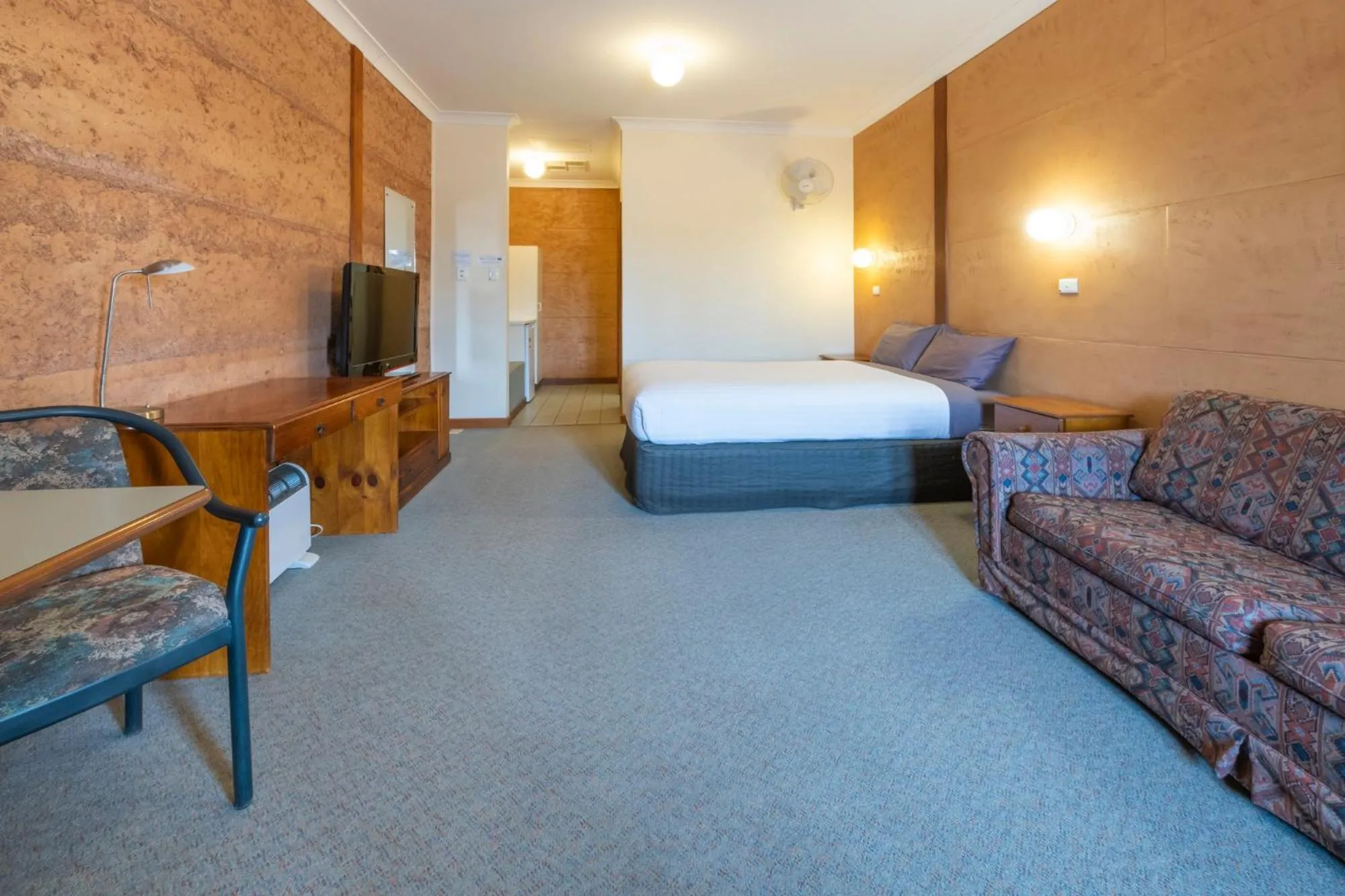 Bed in Mud Hut Motel