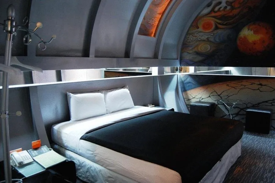 Bed in The Adventure Hotel