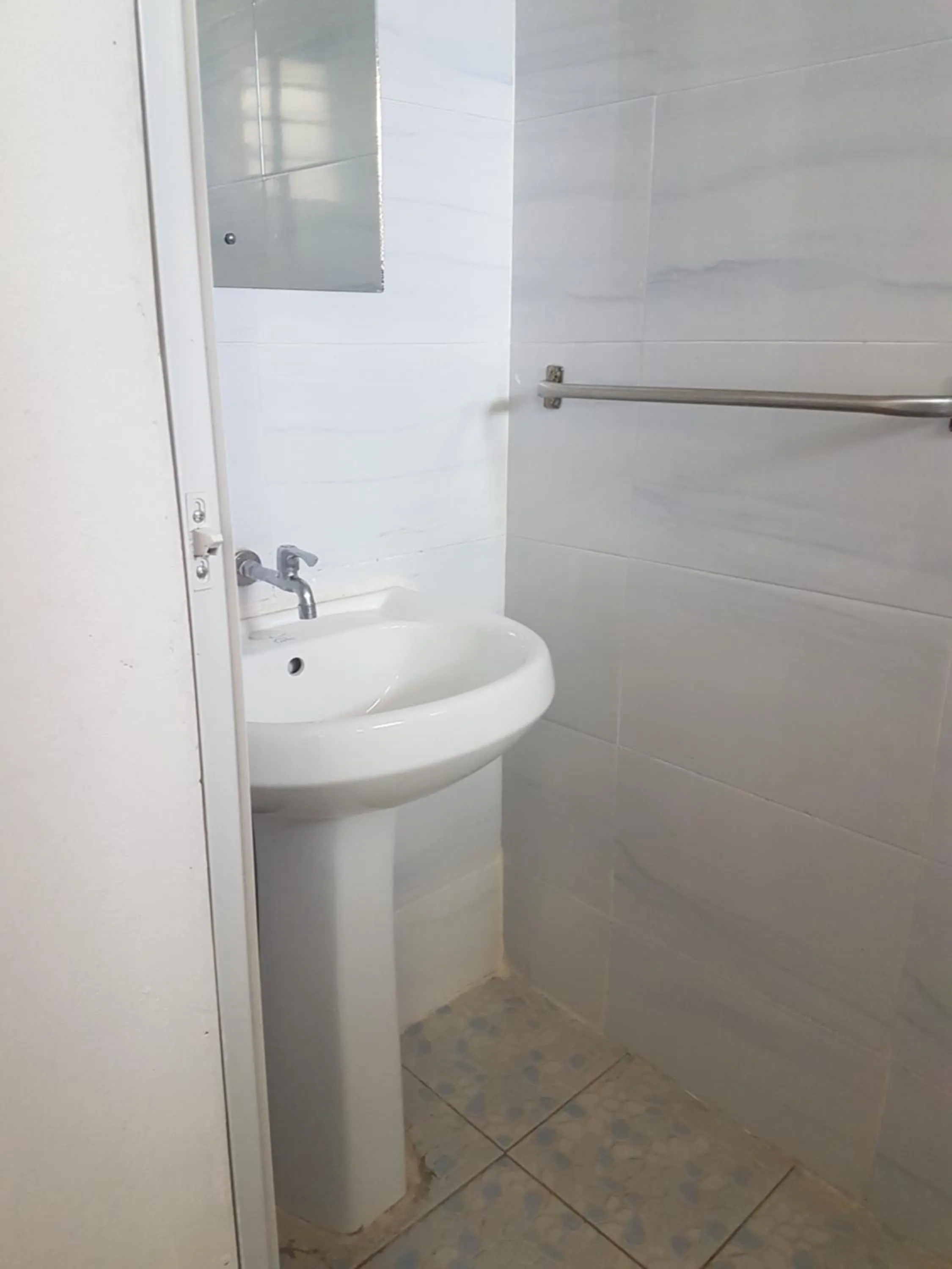 Bathroom in Golden Guest House- Miritini