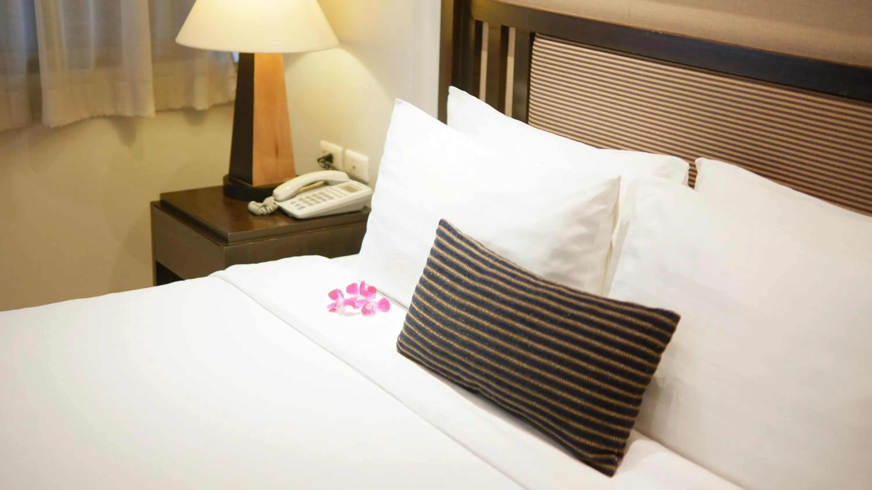 Bed in The Key Bangkok Hotel