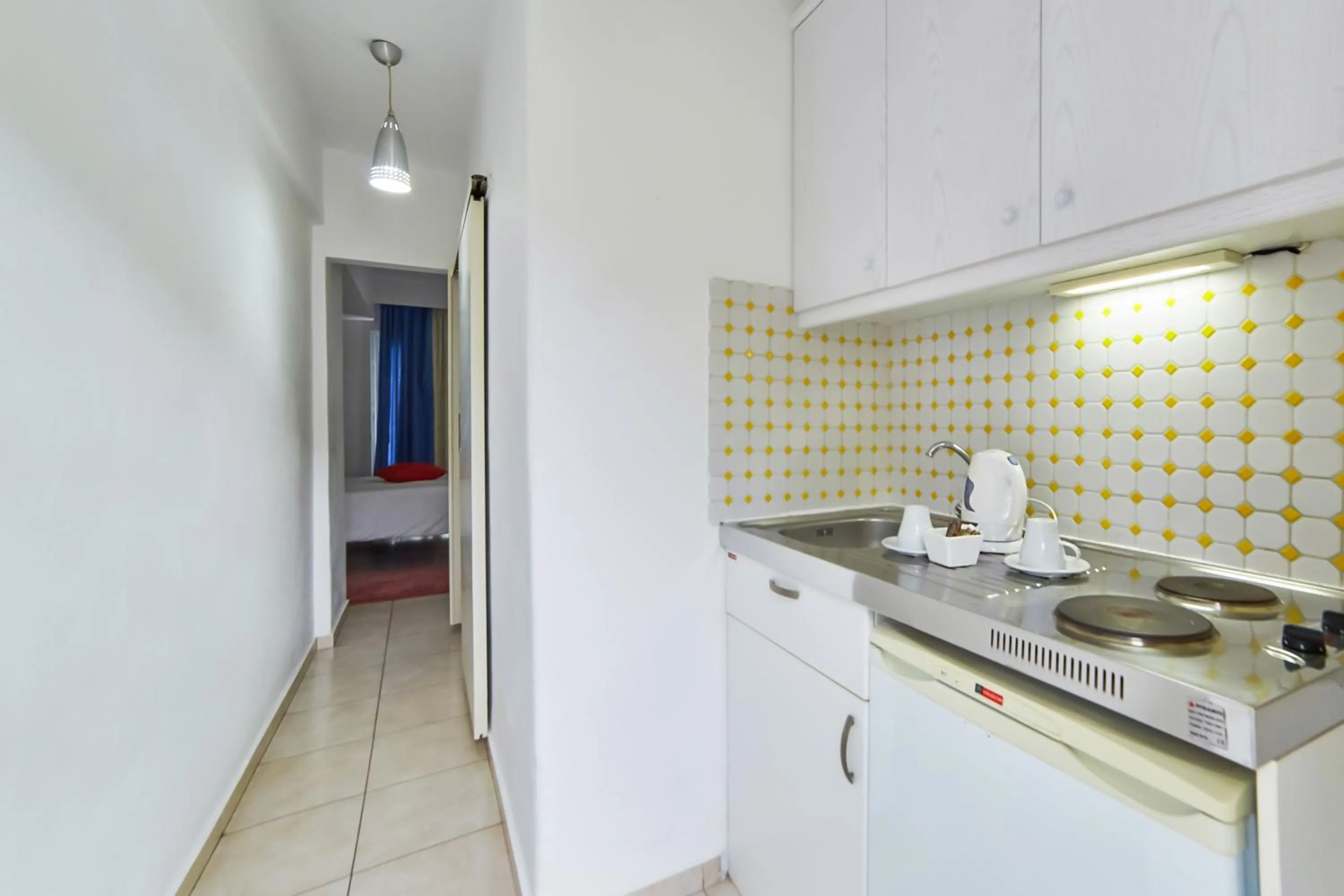 Kitchen or kitchenette in Villa Mare Monte ApartHotel