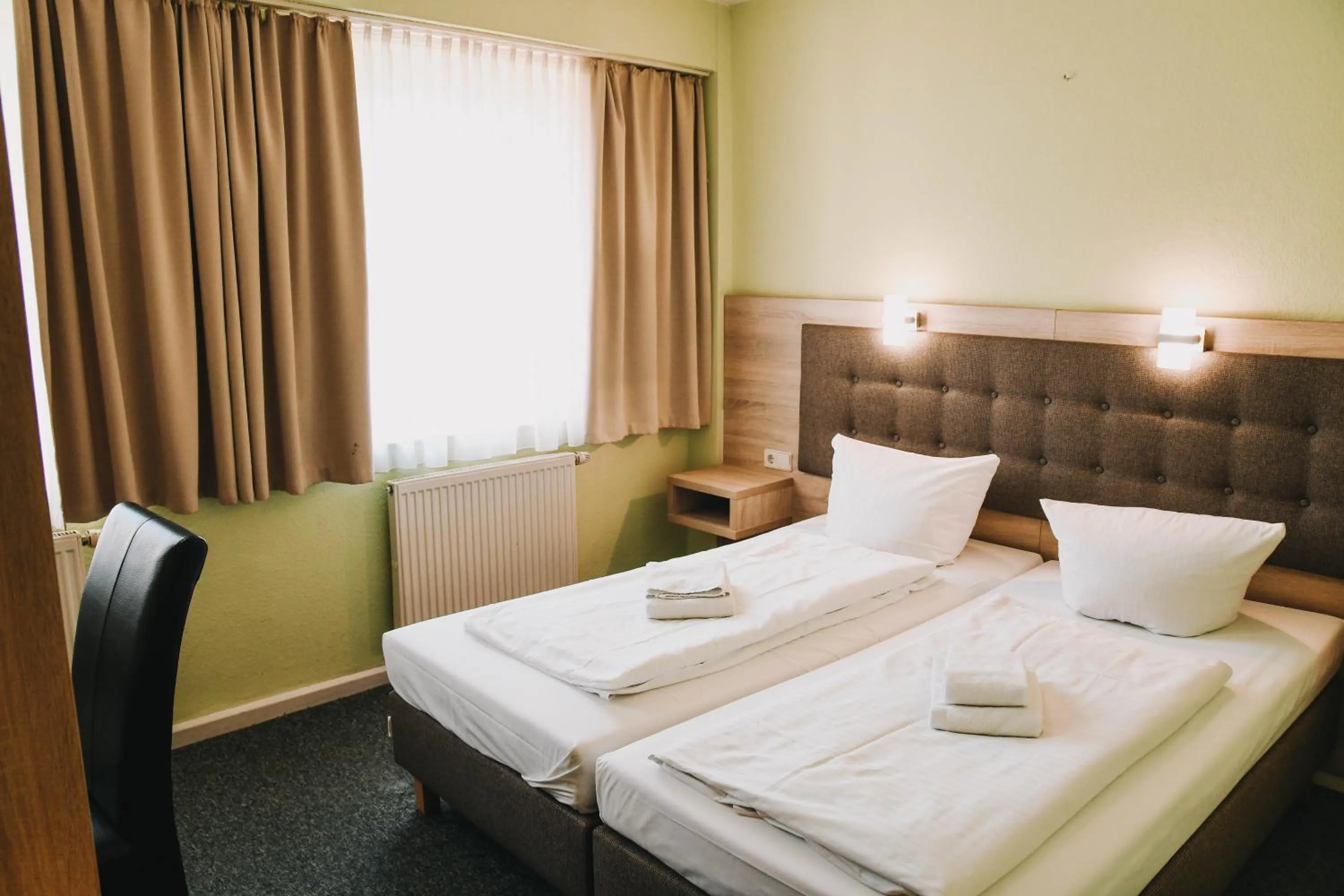 Bed in Hotel-Pension ODIN