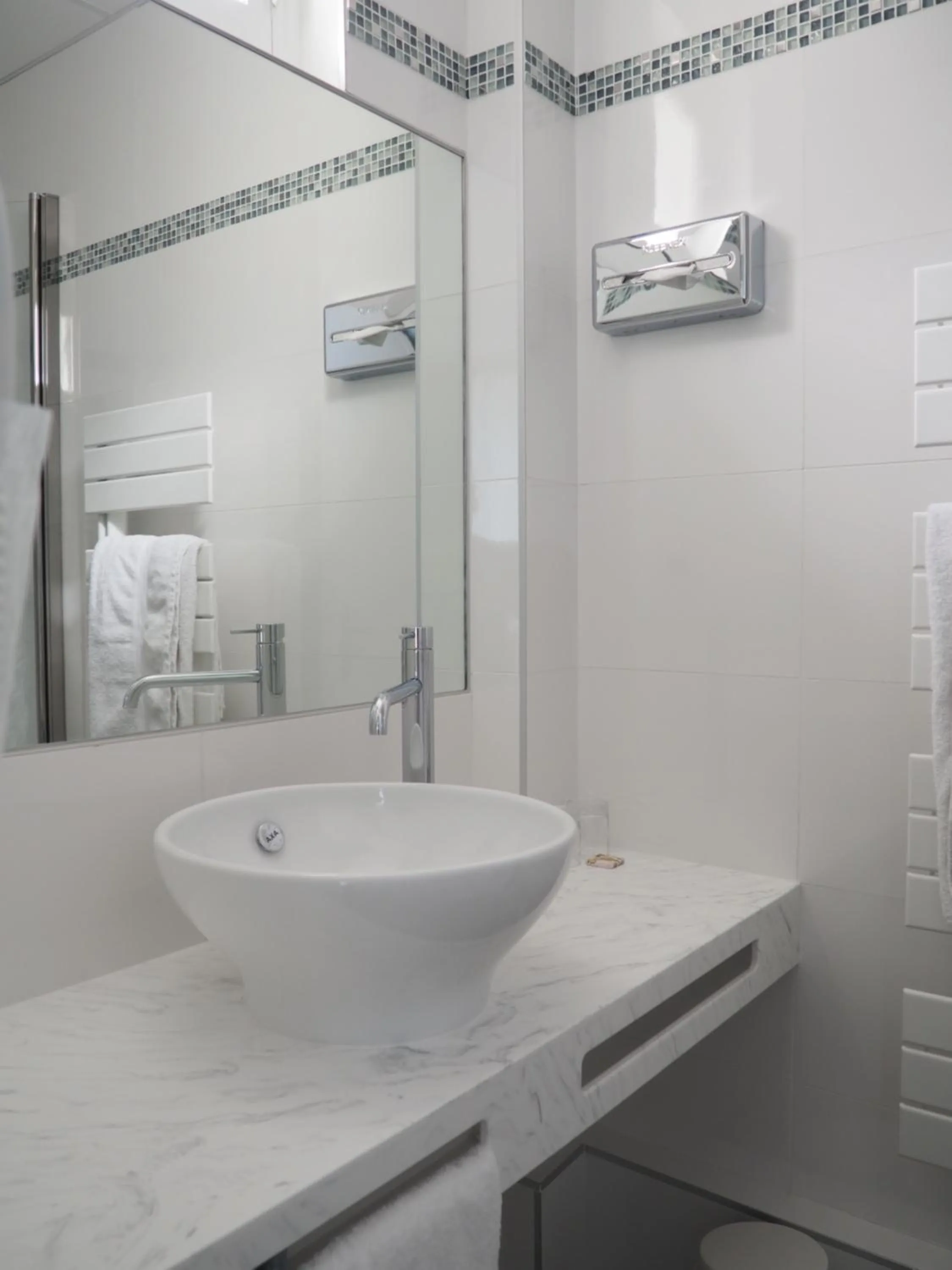 Bathroom in Logis Hotel Royal Saint-Mart