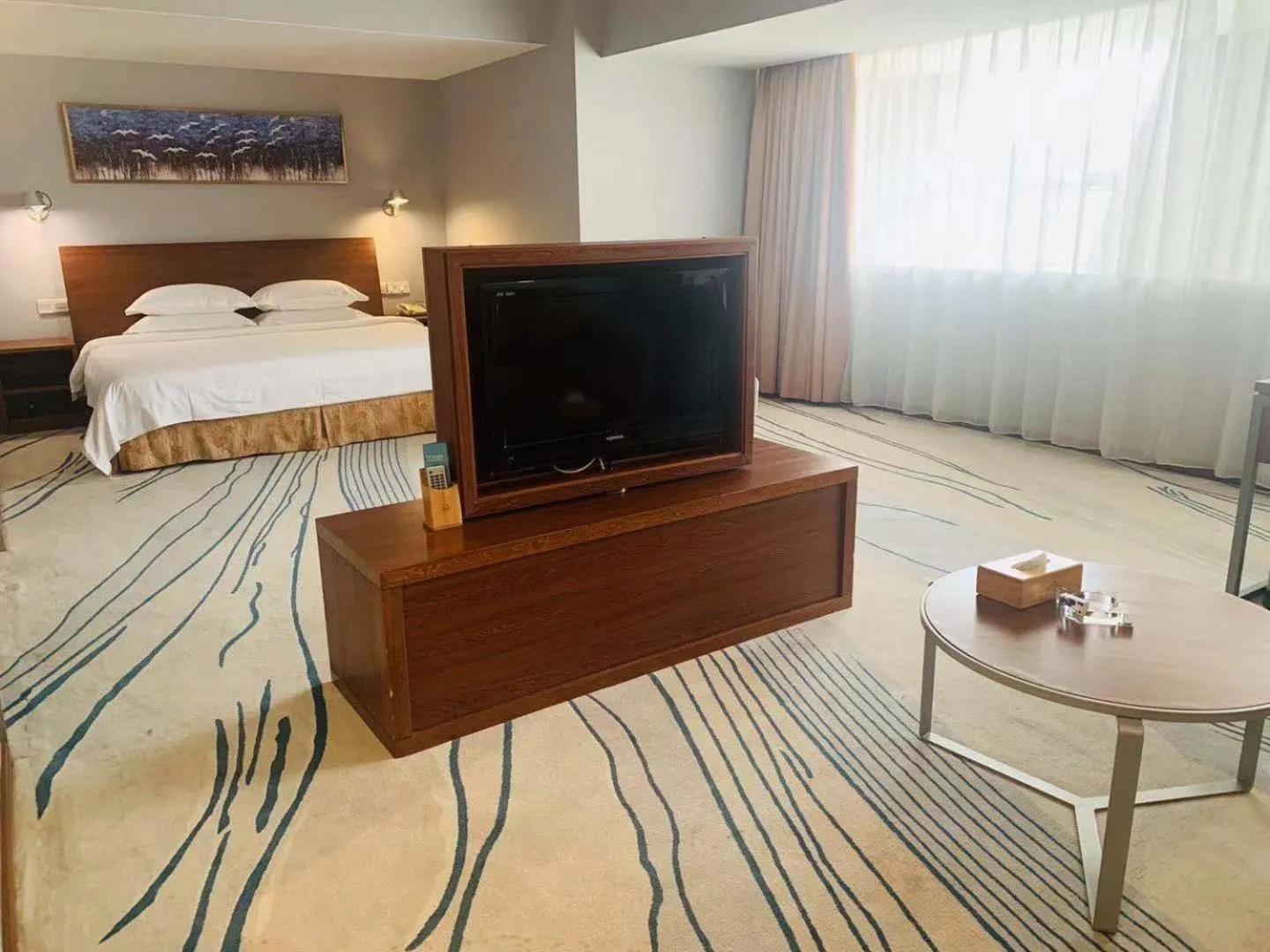 Communal lounge/ TV room, Bed in Days Inn Guangzhou