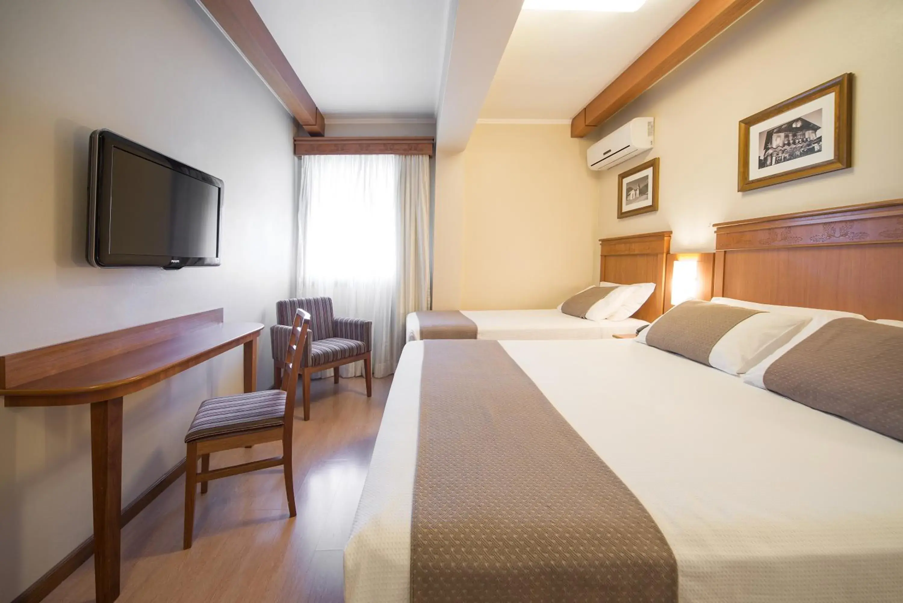 Deluxe Triple Room in Hotel Laghetto Premio Deluxe Triple Room in Hotel Laghetto Premio