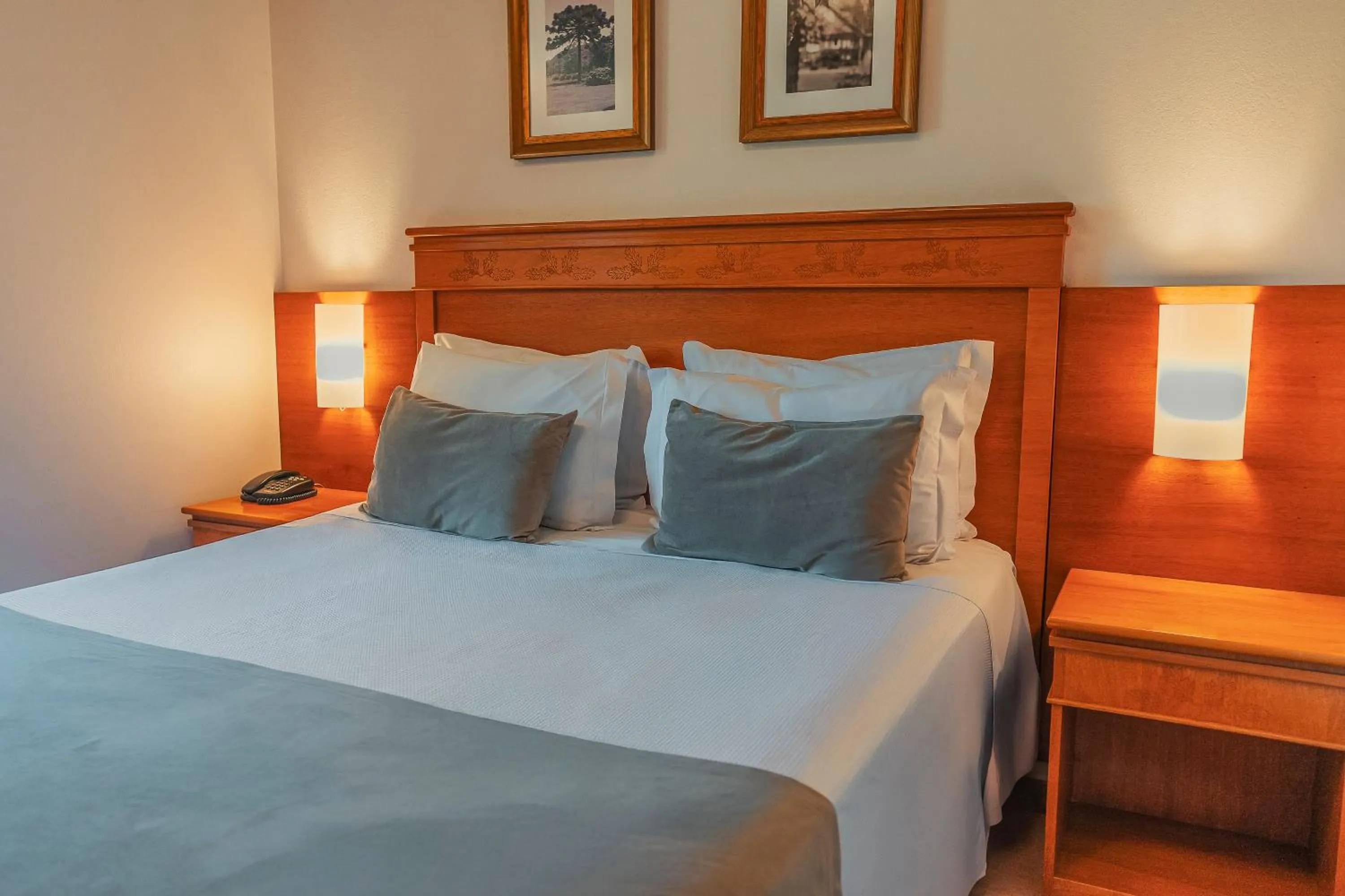 Bed in Hotel Laghetto Premio