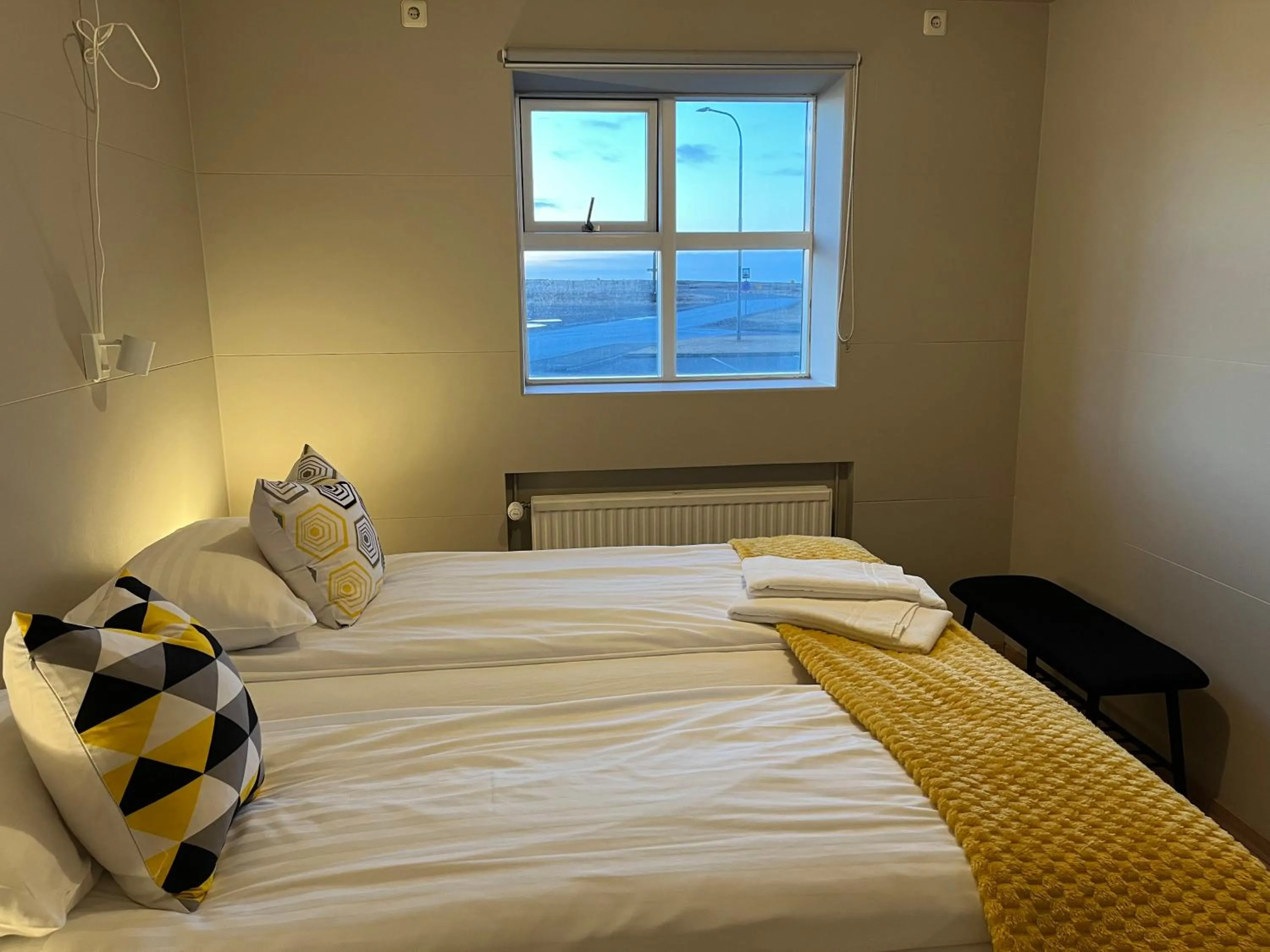 Bed in Guesthouse Hvammur by the Harbour