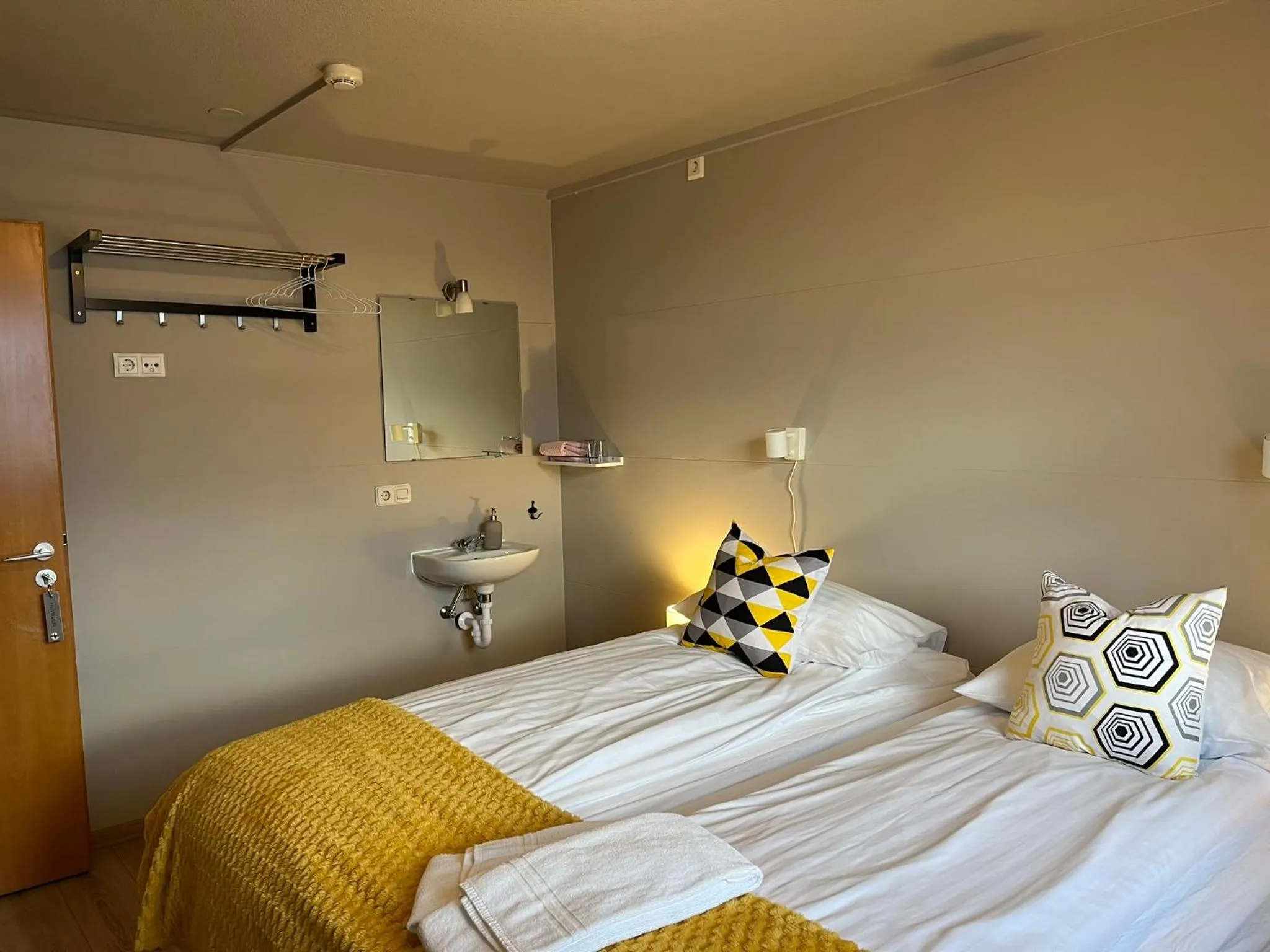 Bed in Guesthouse Hvammur by the Harbour