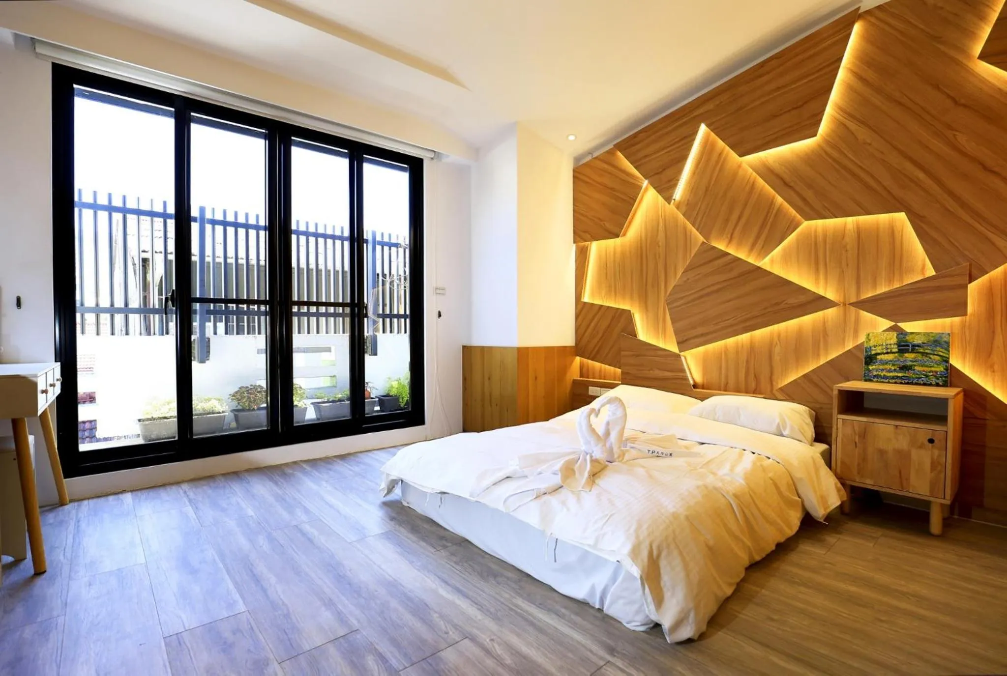 Bed in T.P. Apartment