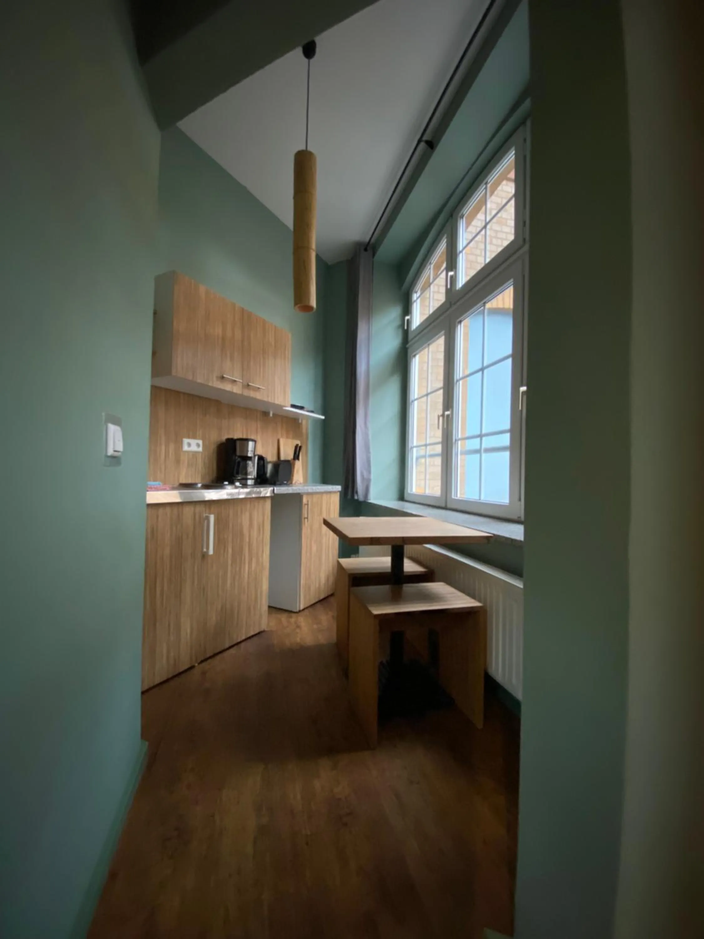 Kitchen or kitchenette in Singer109 Hostel, Hotel & Apartment