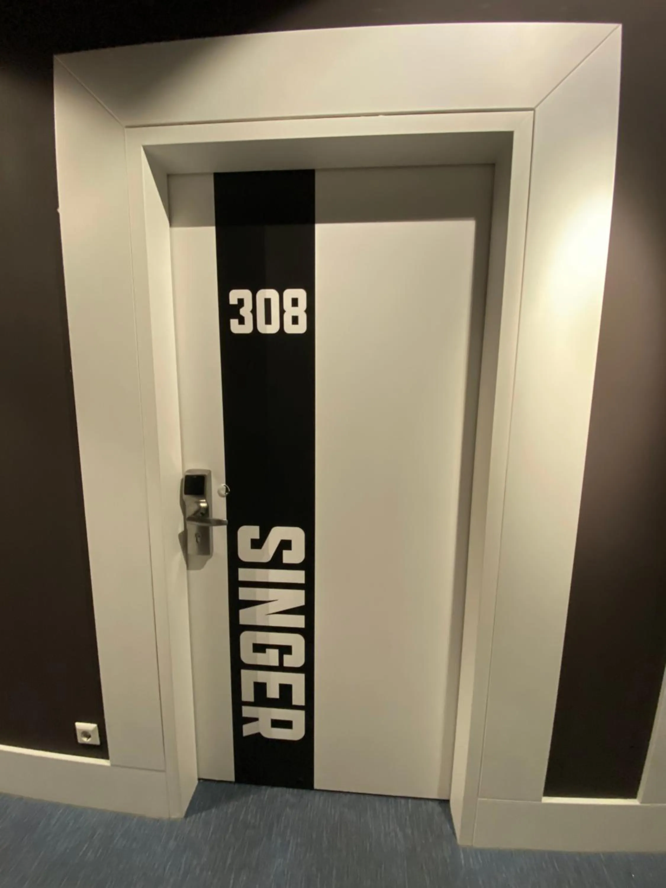 Text overlay in Singer109 Hostel, Hotel & Apartment