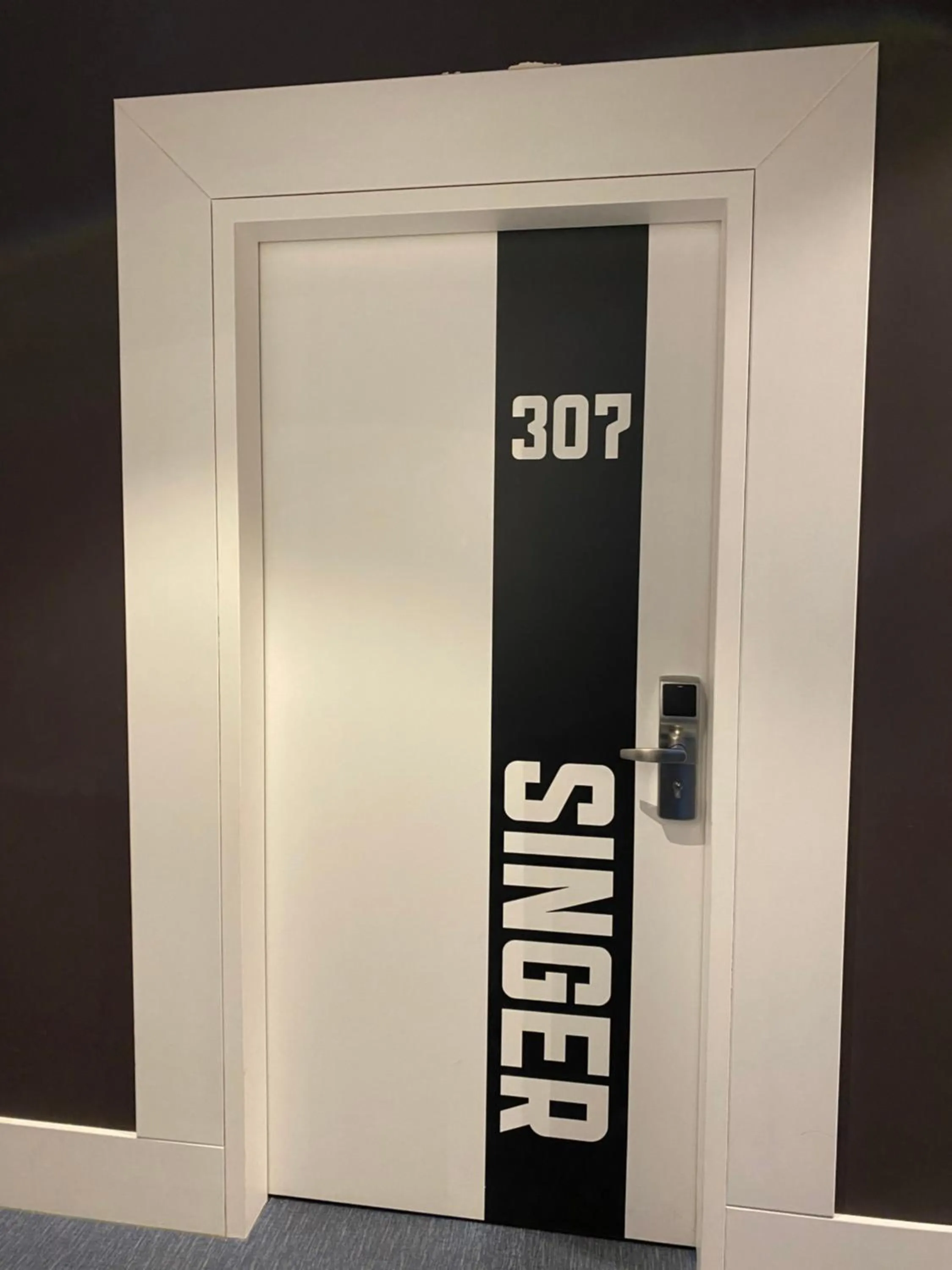 Property logo or sign in Singer109 Hostel, Hotel & Apartment