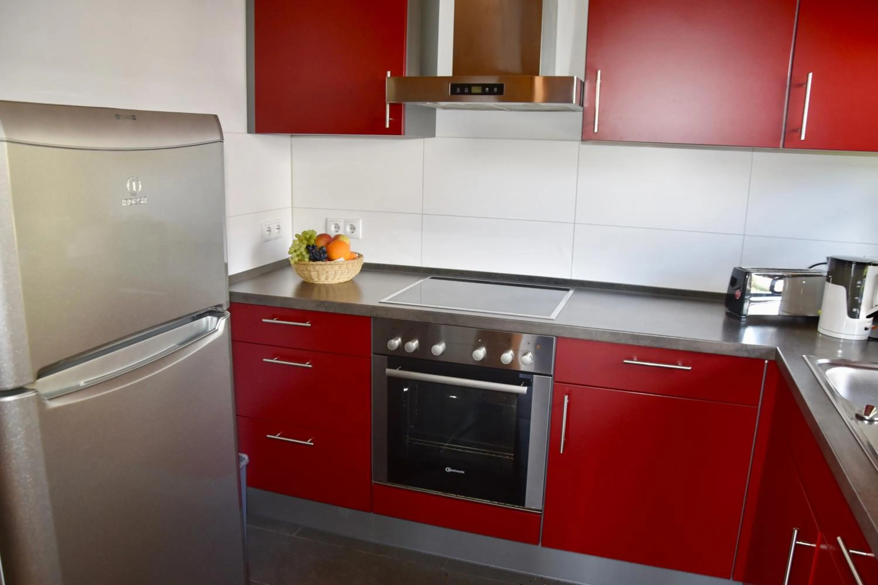 Kitchen or kitchenette in Hotel & Chalets Herrihof