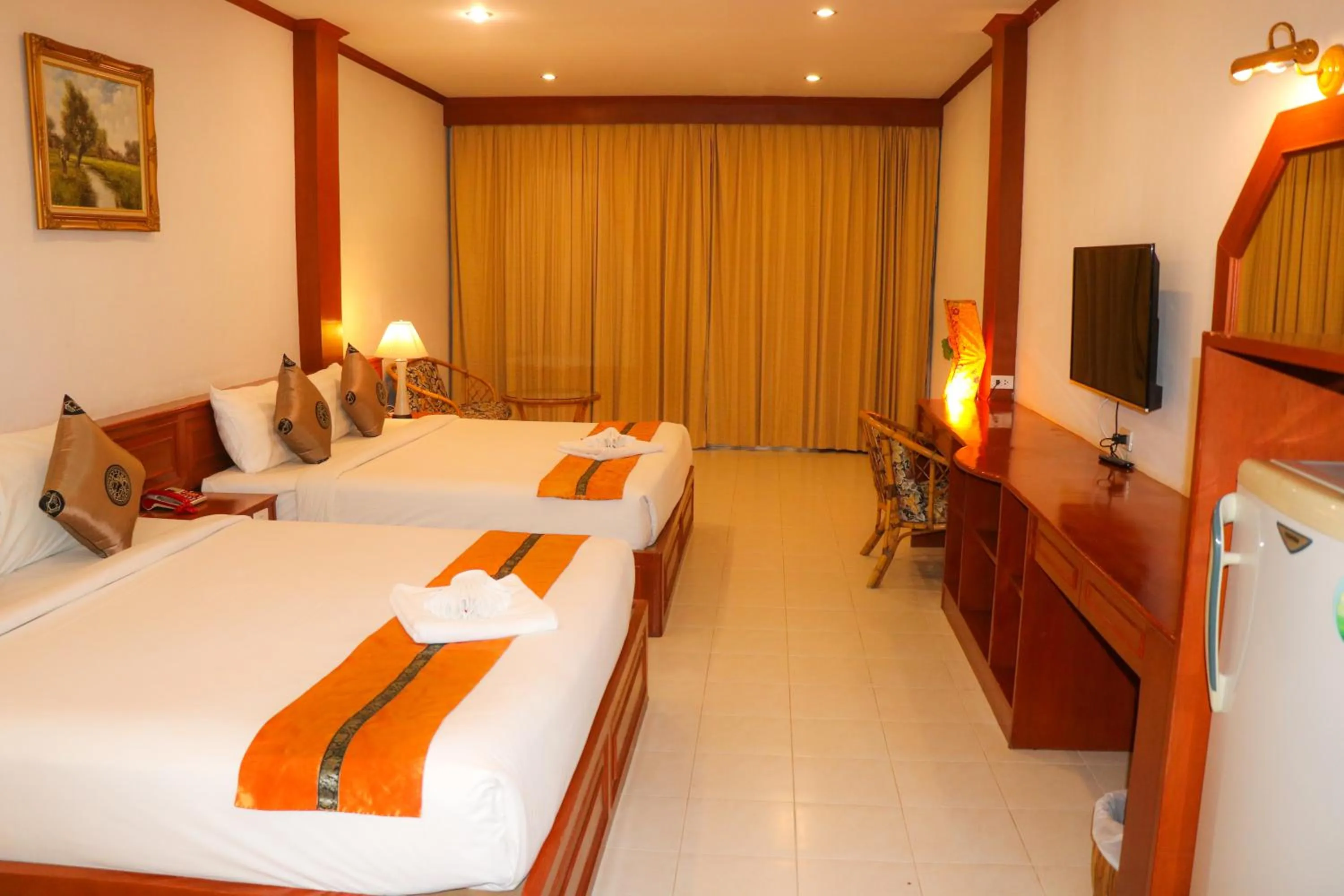 Photo of the whole room, Bed in Andaman Seaside Resort Bangtao Beach