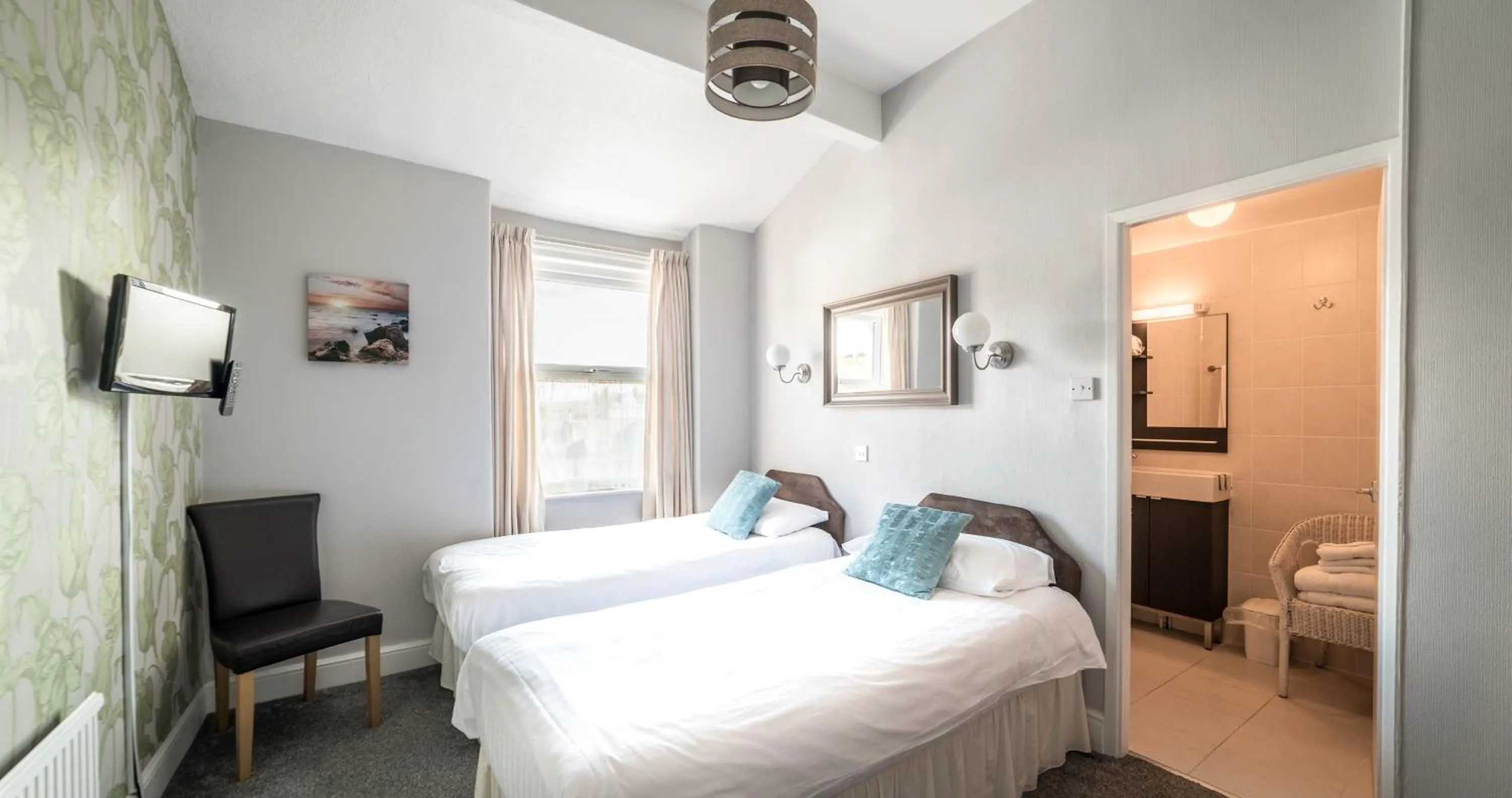 Bed in The Grafton Guest House