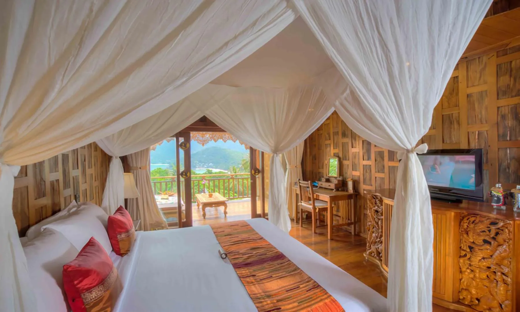 Bed in Santhiya Koh Phangan Resort and Spa