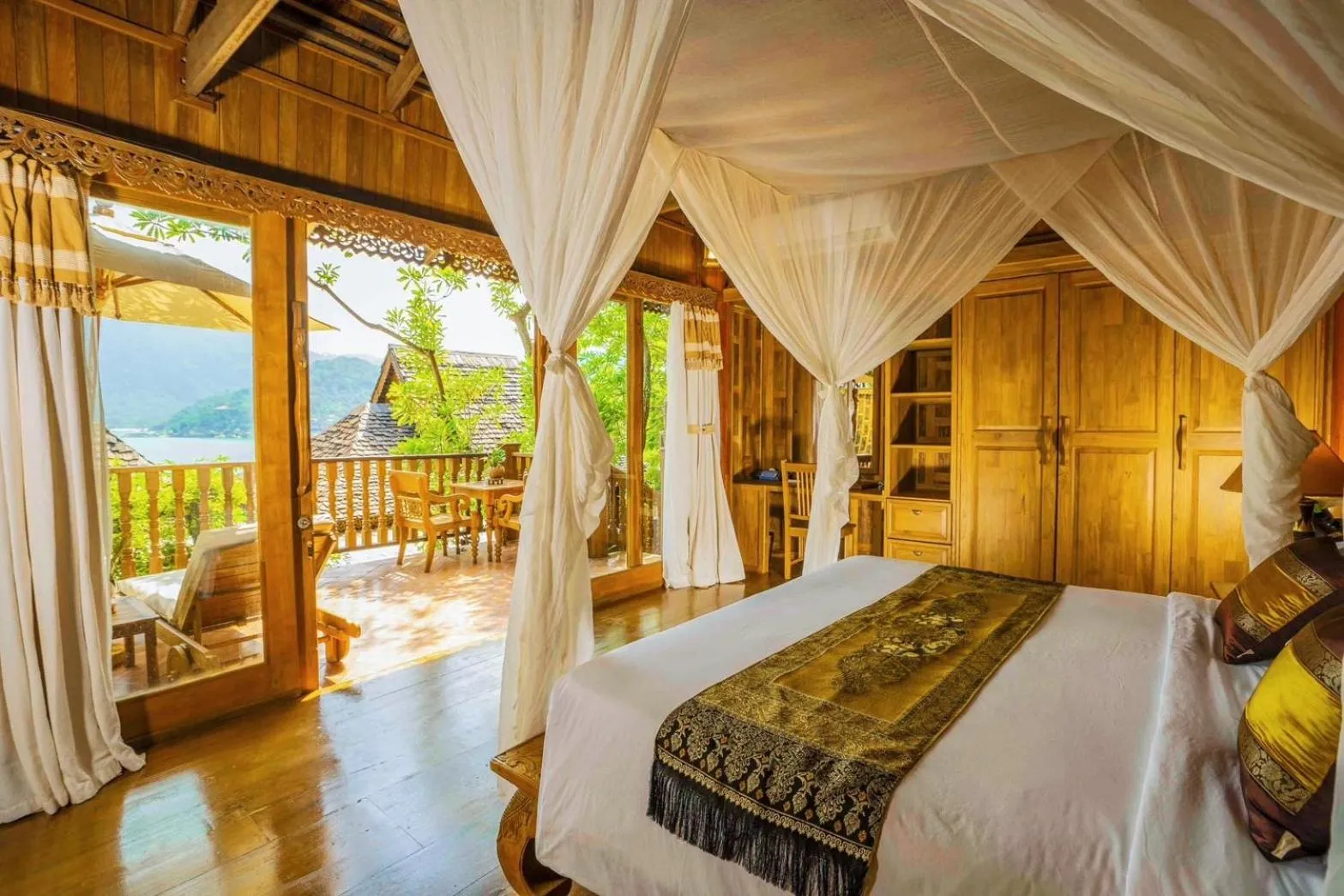 Bed in Santhiya Koh Phangan Resort and Spa