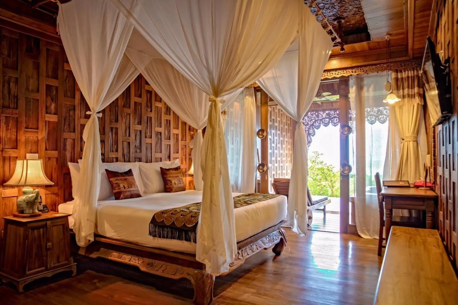 Bed in Santhiya Koh Phangan Resort and Spa