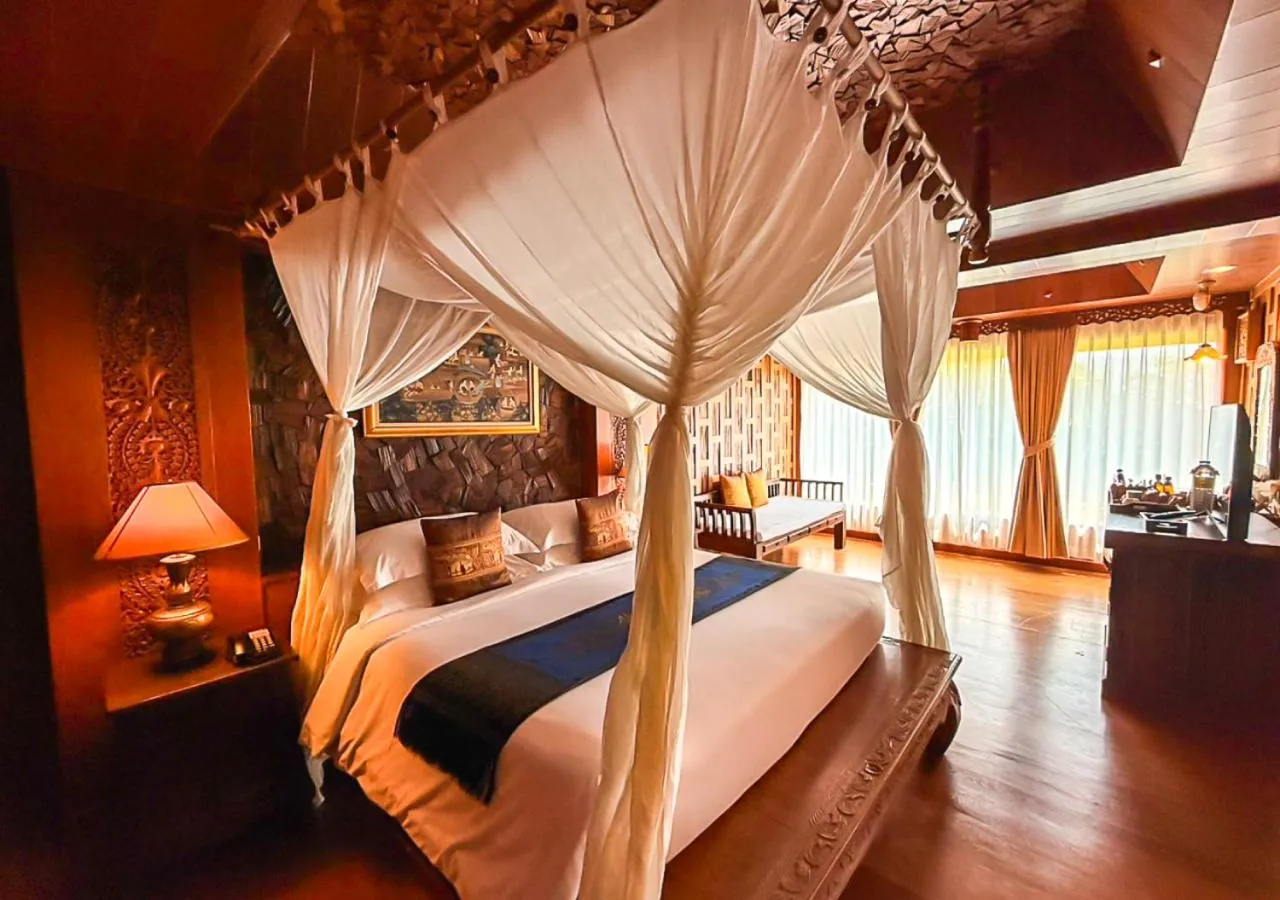 Bed in Santhiya Koh Phangan Resort and Spa