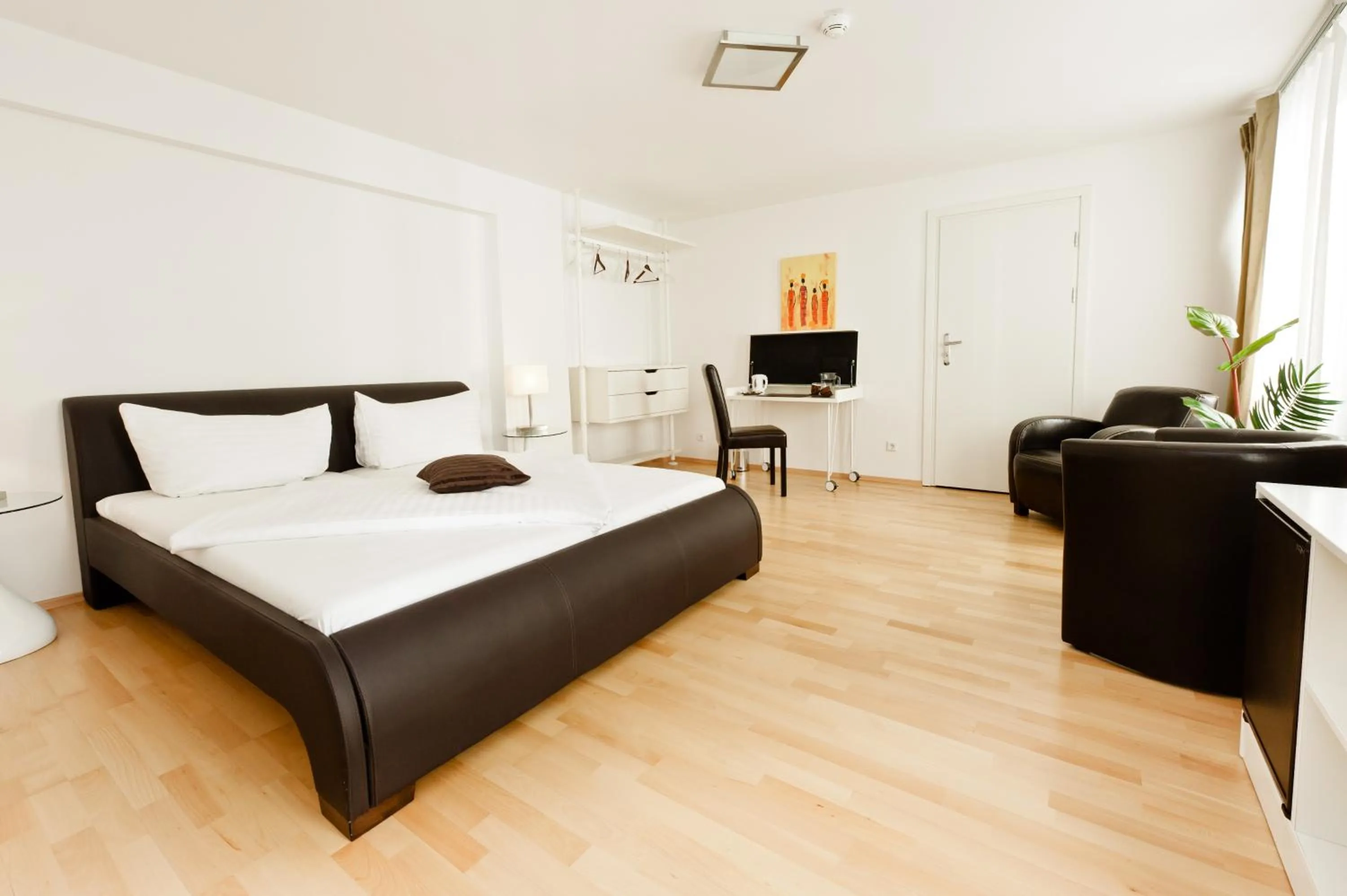 Bed in VOX Design Hotel