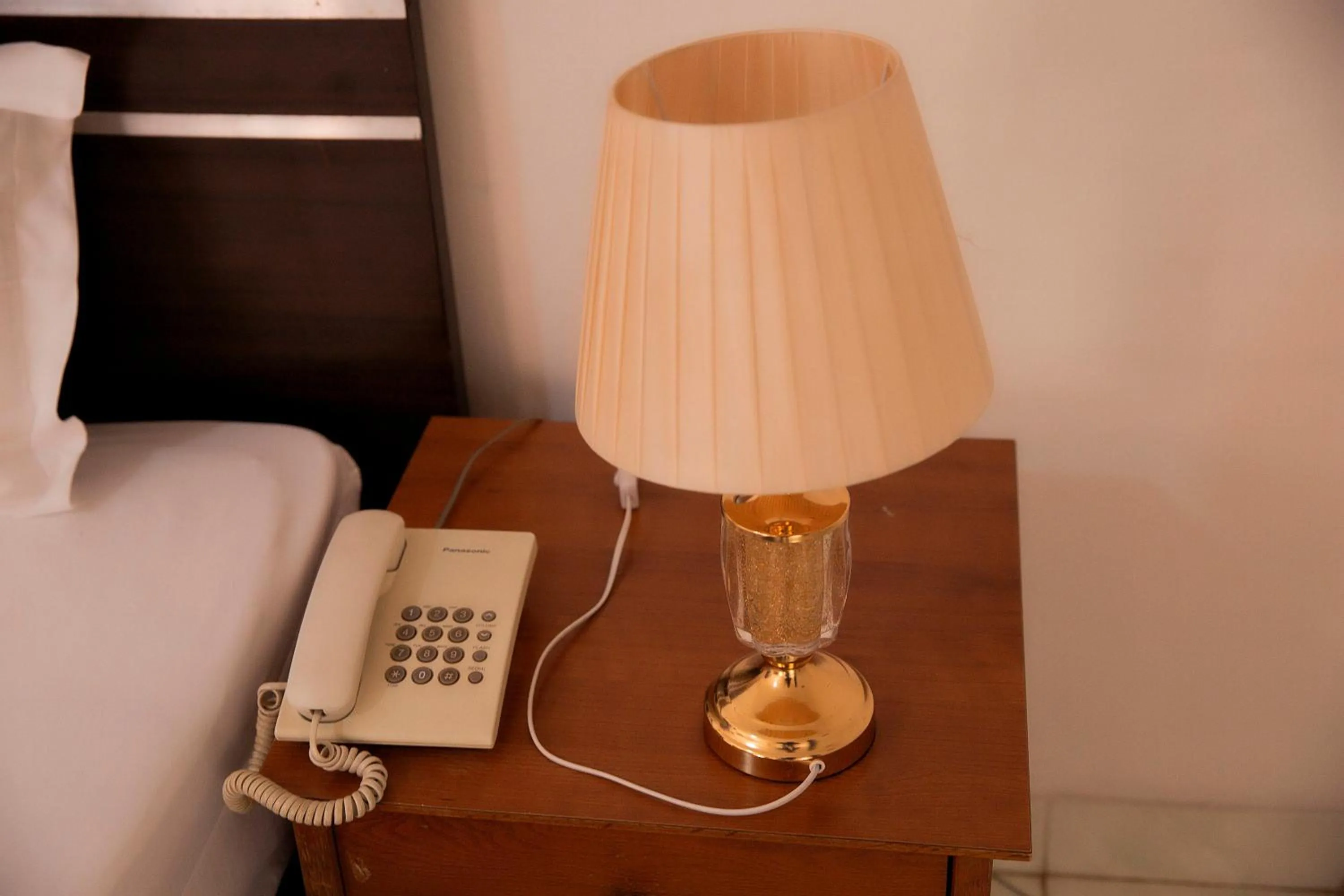 Bed in Romalo Hotel & Apartments