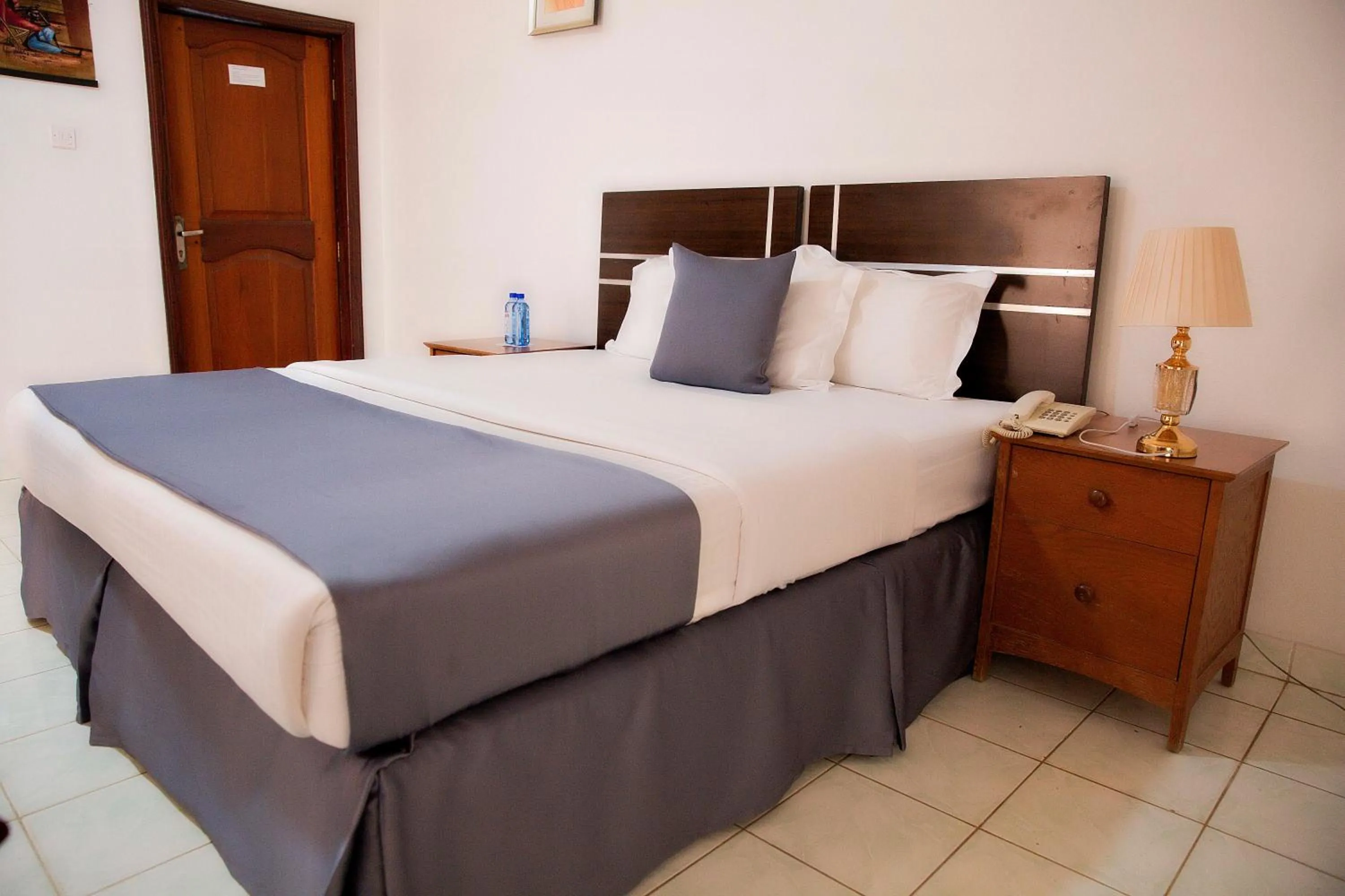 Bed in Romalo Hotel & Apartments