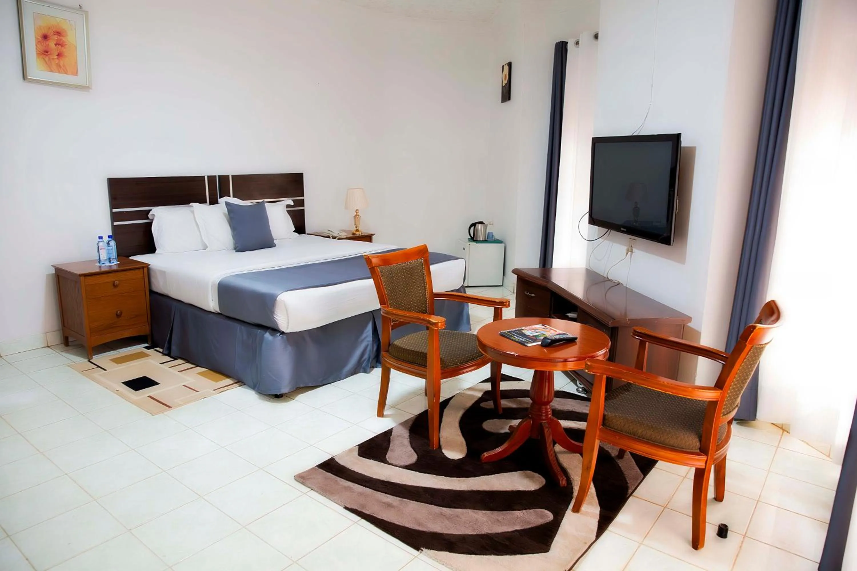 Bed in Romalo Hotel & Apartments