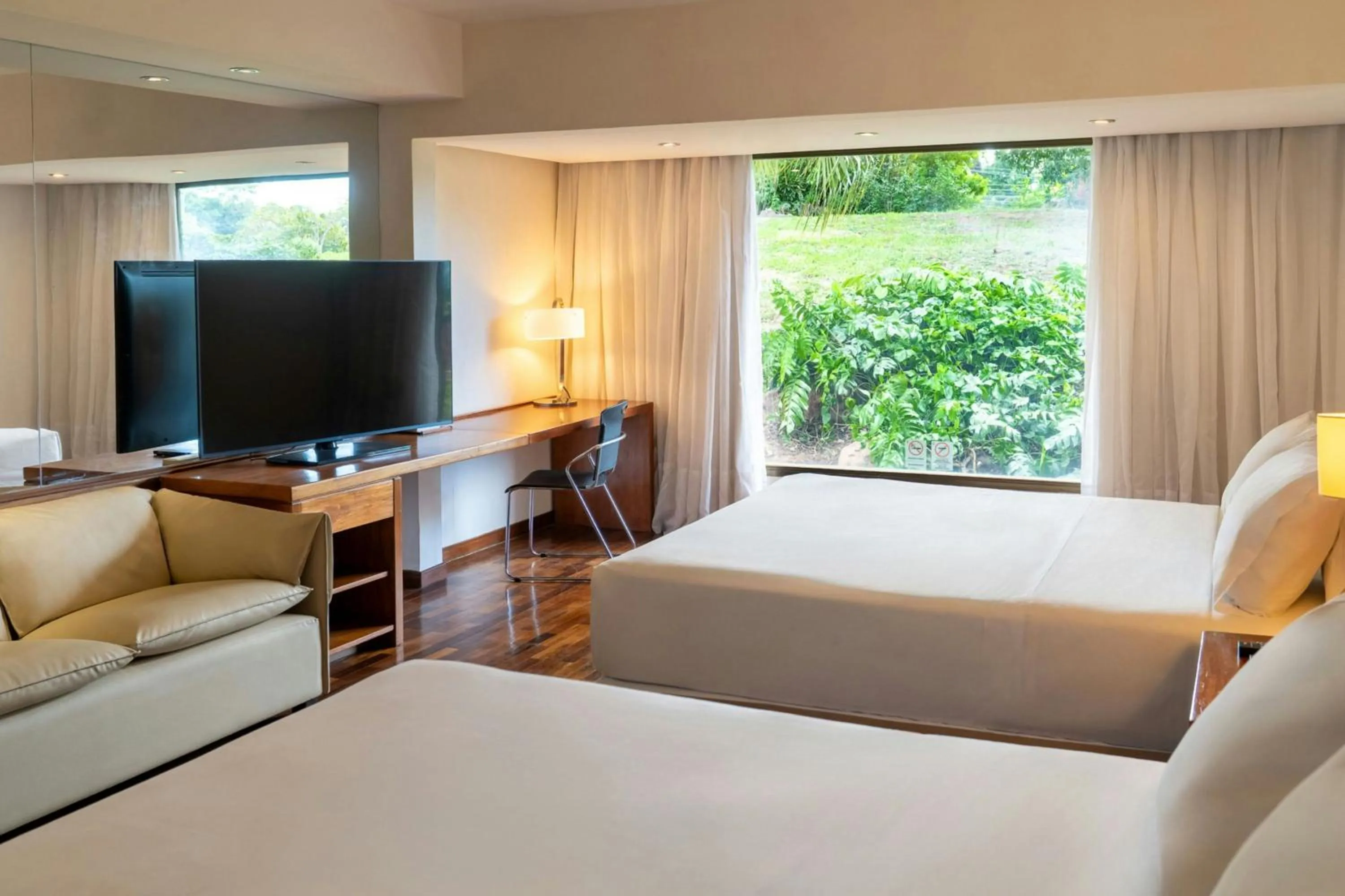 Photo of the whole room, Bed in Yacht & Golf Club Paraguayo, a Tribute Portfolio Resort