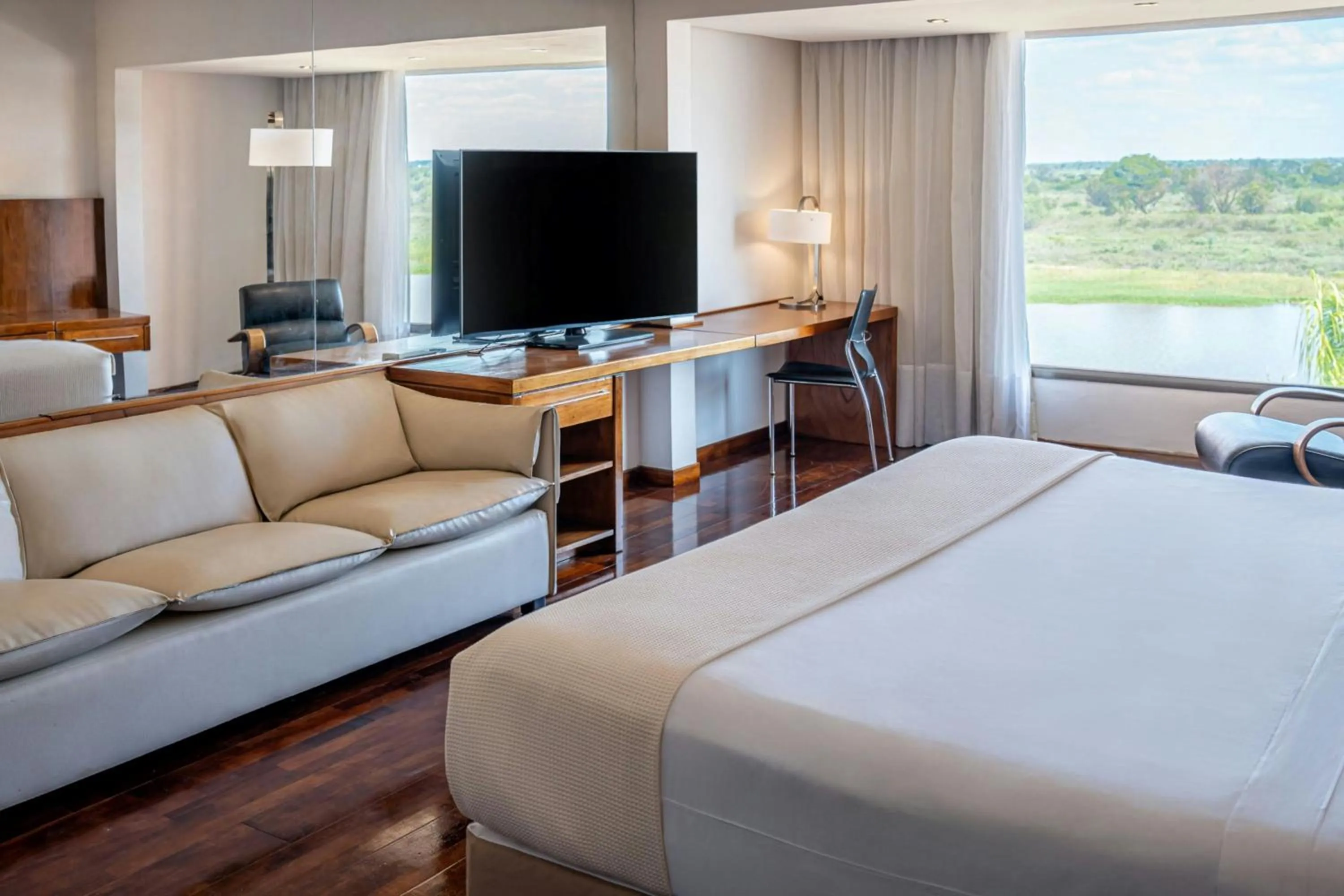 Photo of the whole room, Bed in Yacht & Golf Club Paraguayo, a Tribute Portfolio Resort