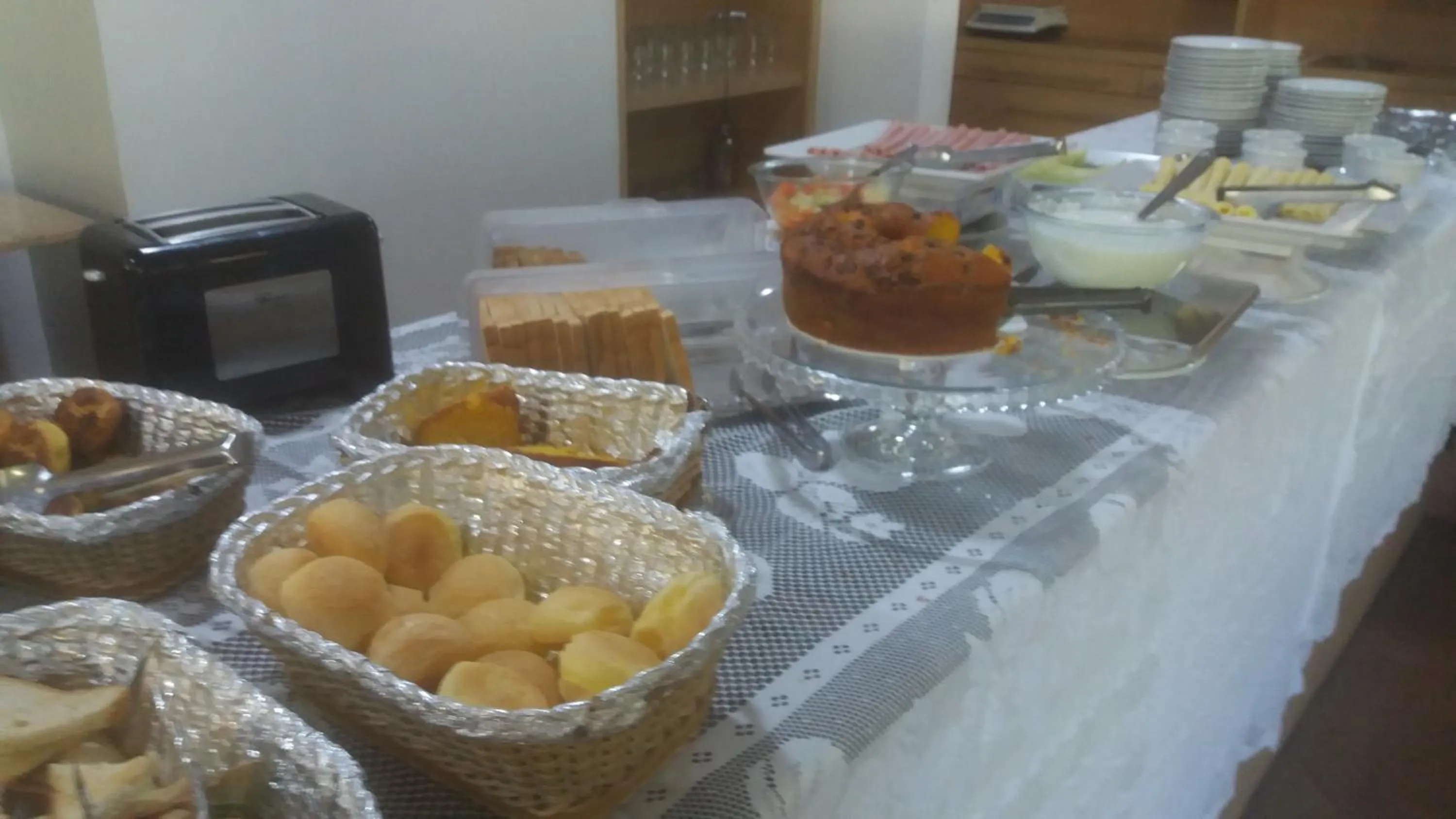 Buffet breakfast in Flat Oeste La Residence