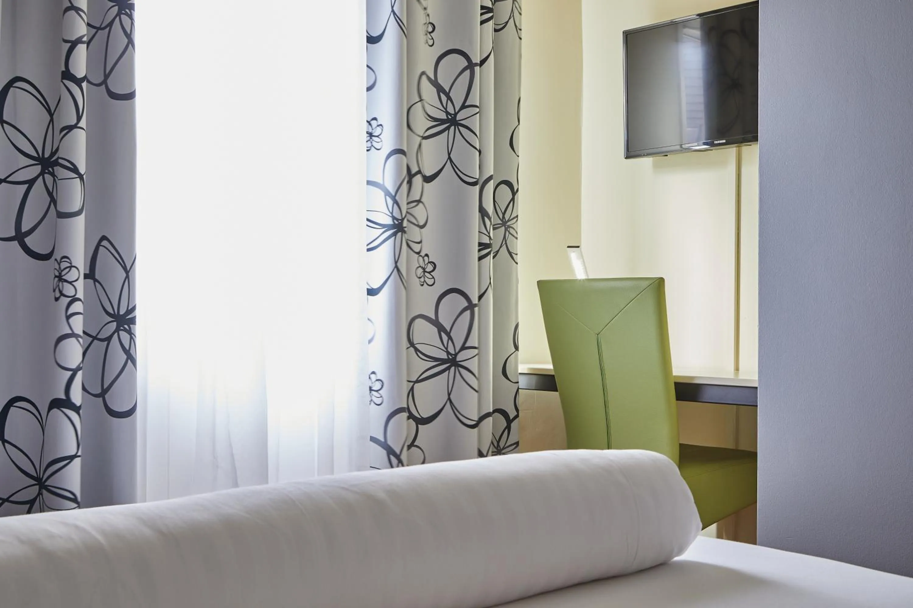 Bed in Hotel Riviera