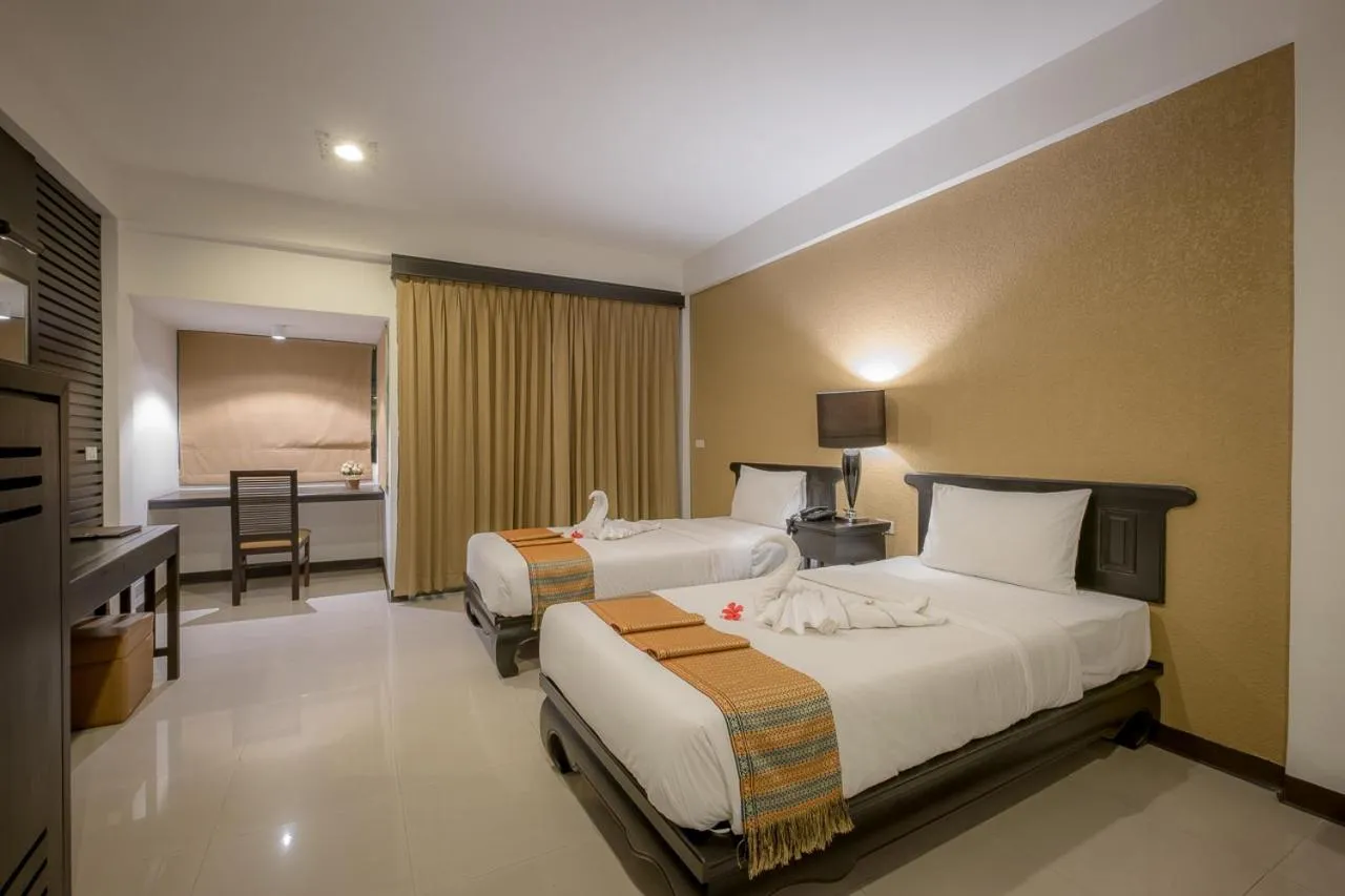 Bed in Siam Piman Hotel